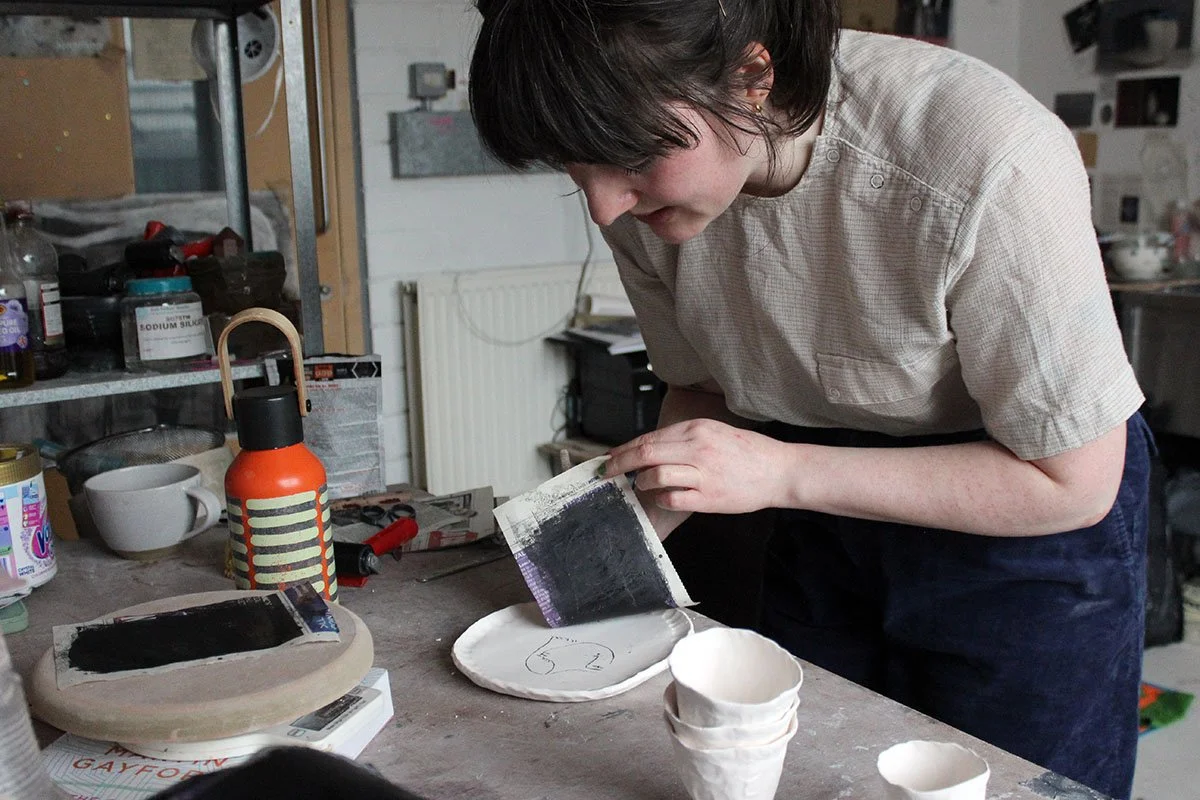 Female ceramic artist in studio