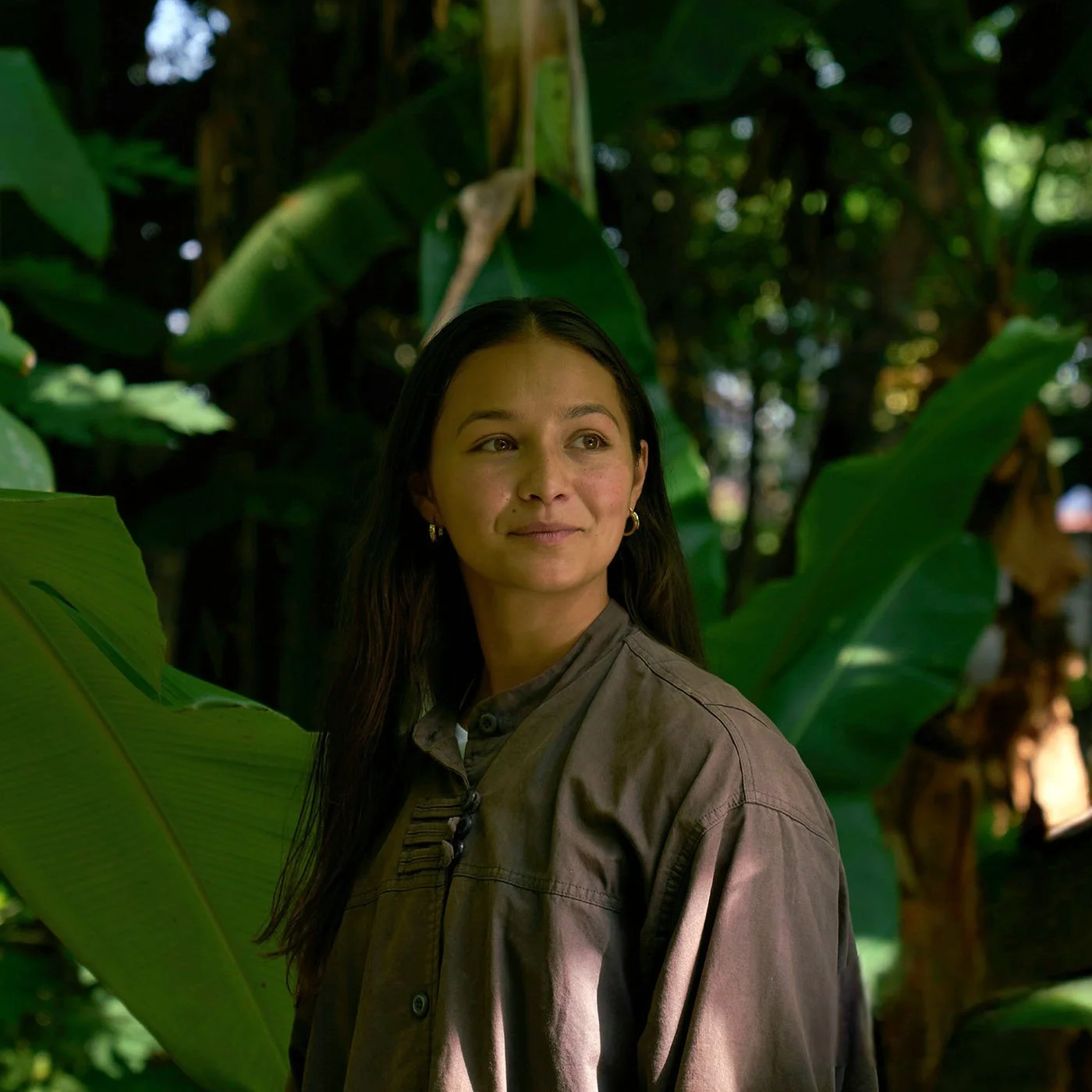 Smiling female with forest in the background