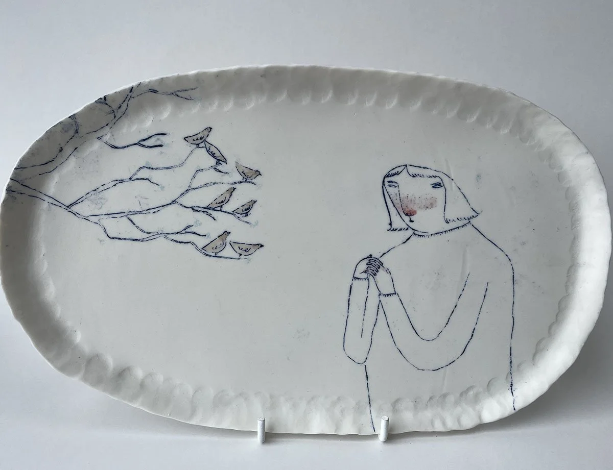 Illustrated ceramic plate