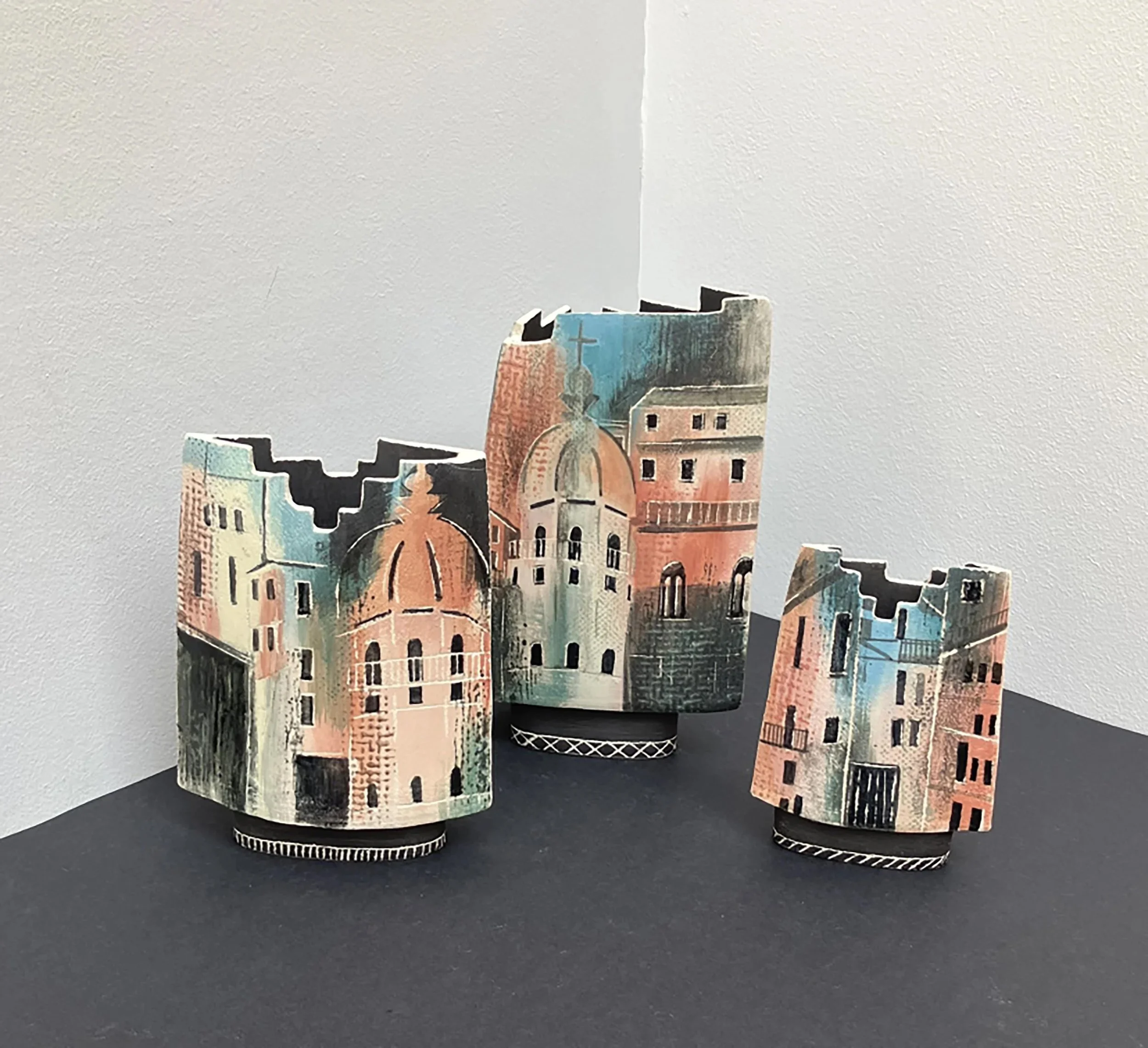 Ceramic vessels illustrated with buildings