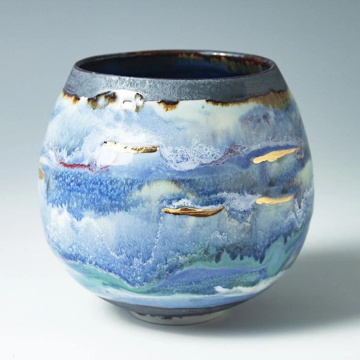 Blue glazed ceramic vessel