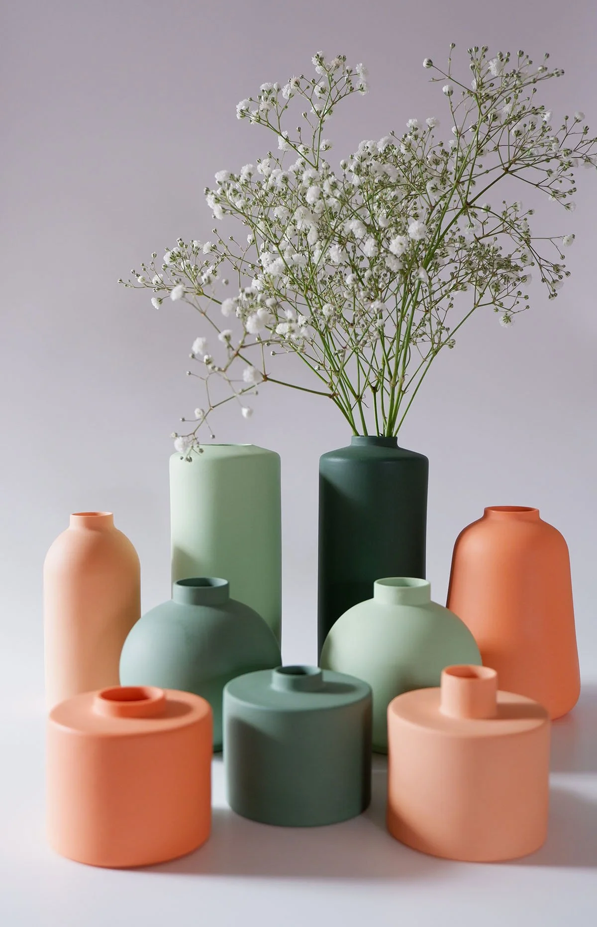 A group of colourful ceramic vessels