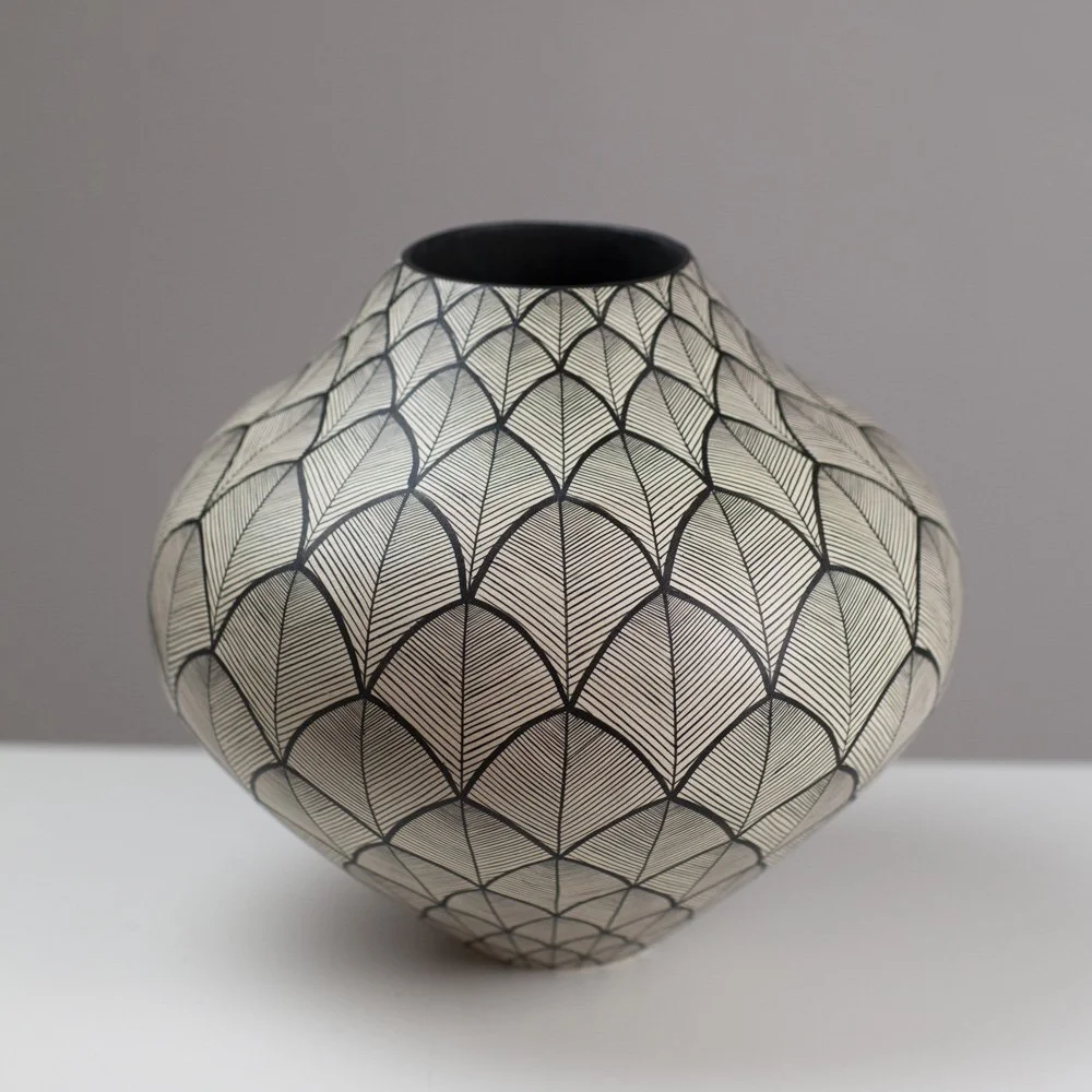 Black and white patterned ceramic vase