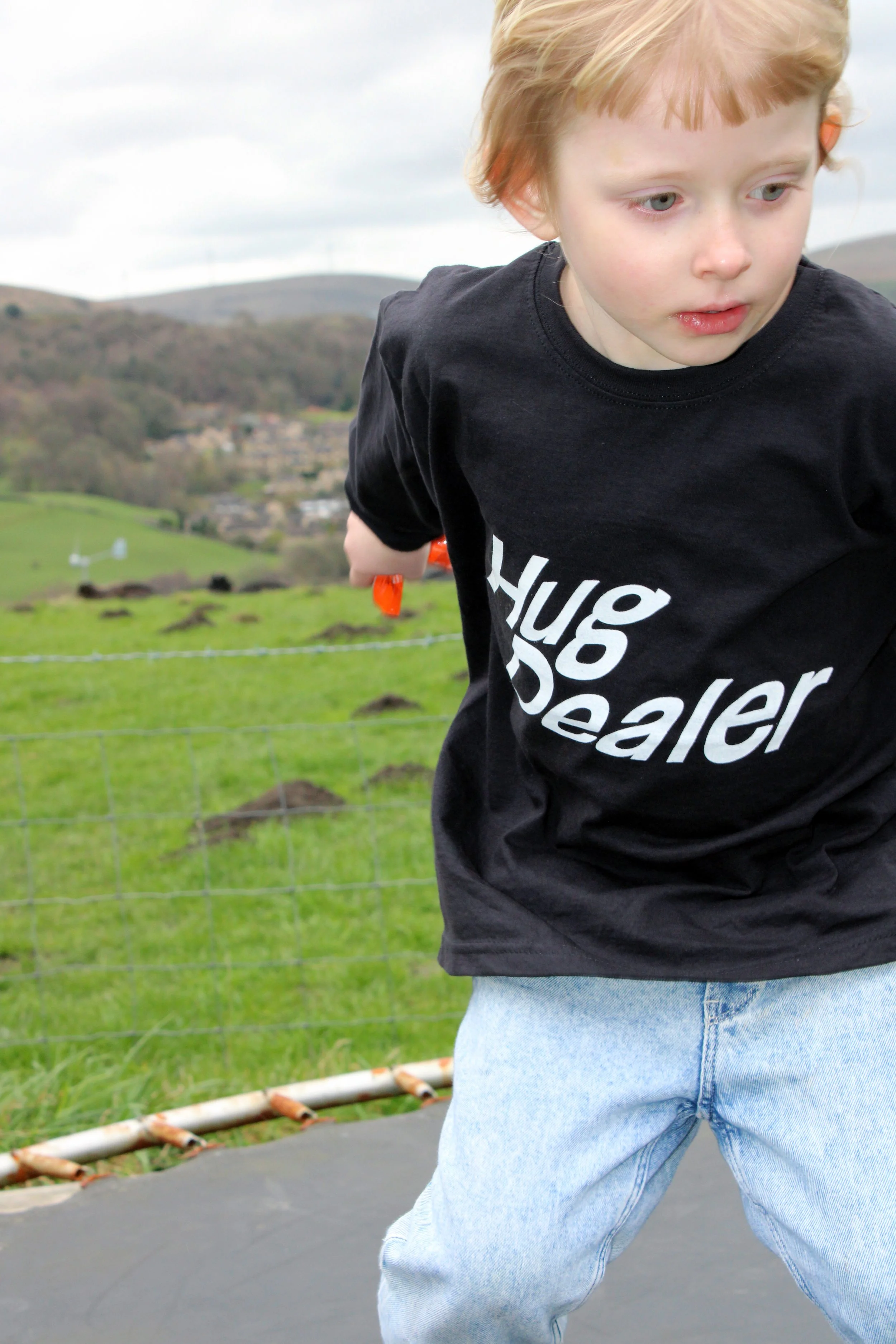 Graphic of Kids Hug Dealer Long Sleeve T-Shirt - white graphic on Black