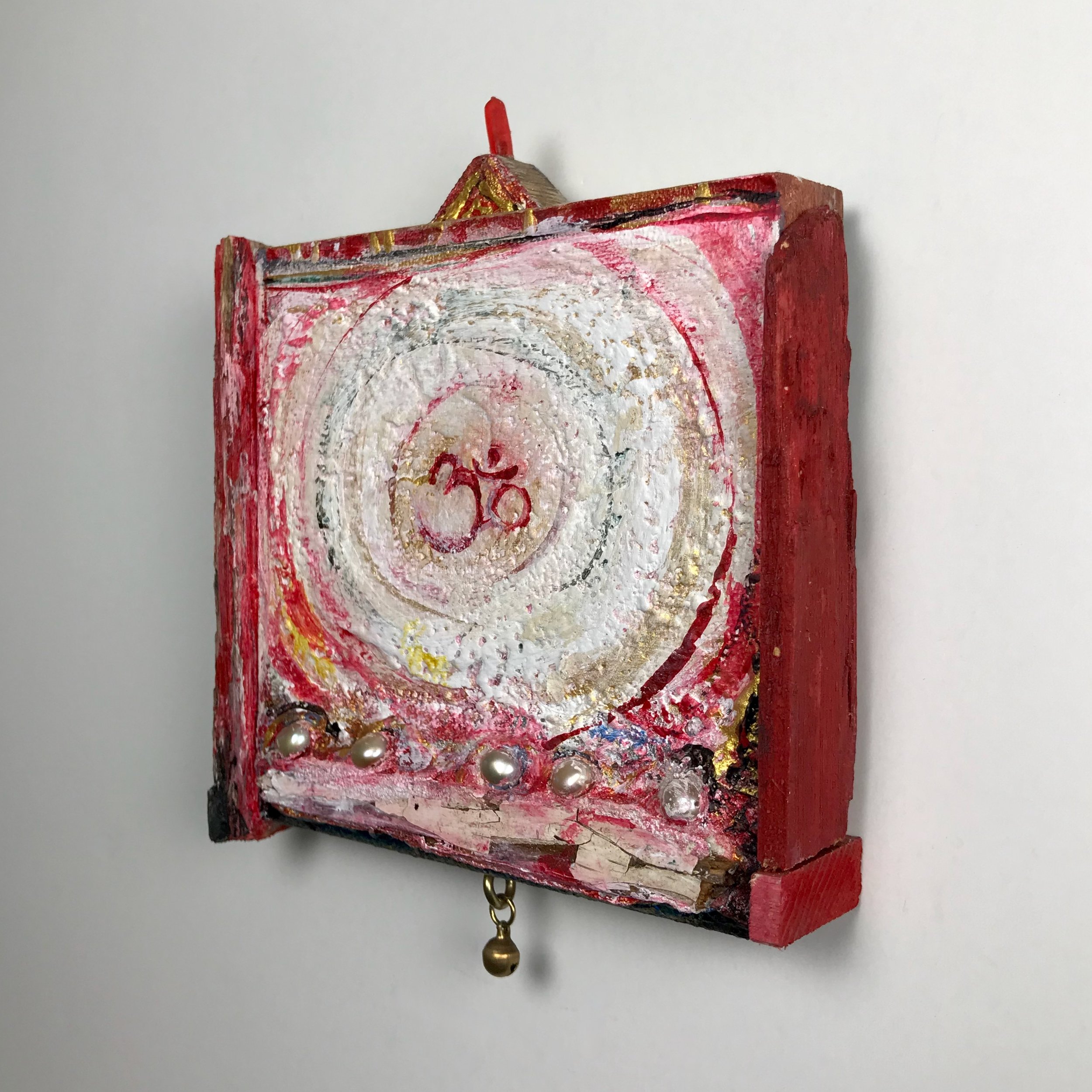 Laura-Trisiano-Om-2-5.5_hx4.5_wx1_d-one-of-a-kind-mixed-media-found-object-painting-art-reclaimed-upcycled-old-wood-freshwater-pearls-red-plastic-finial-paint- aum-mantra-universal-sound- (2).jpeg