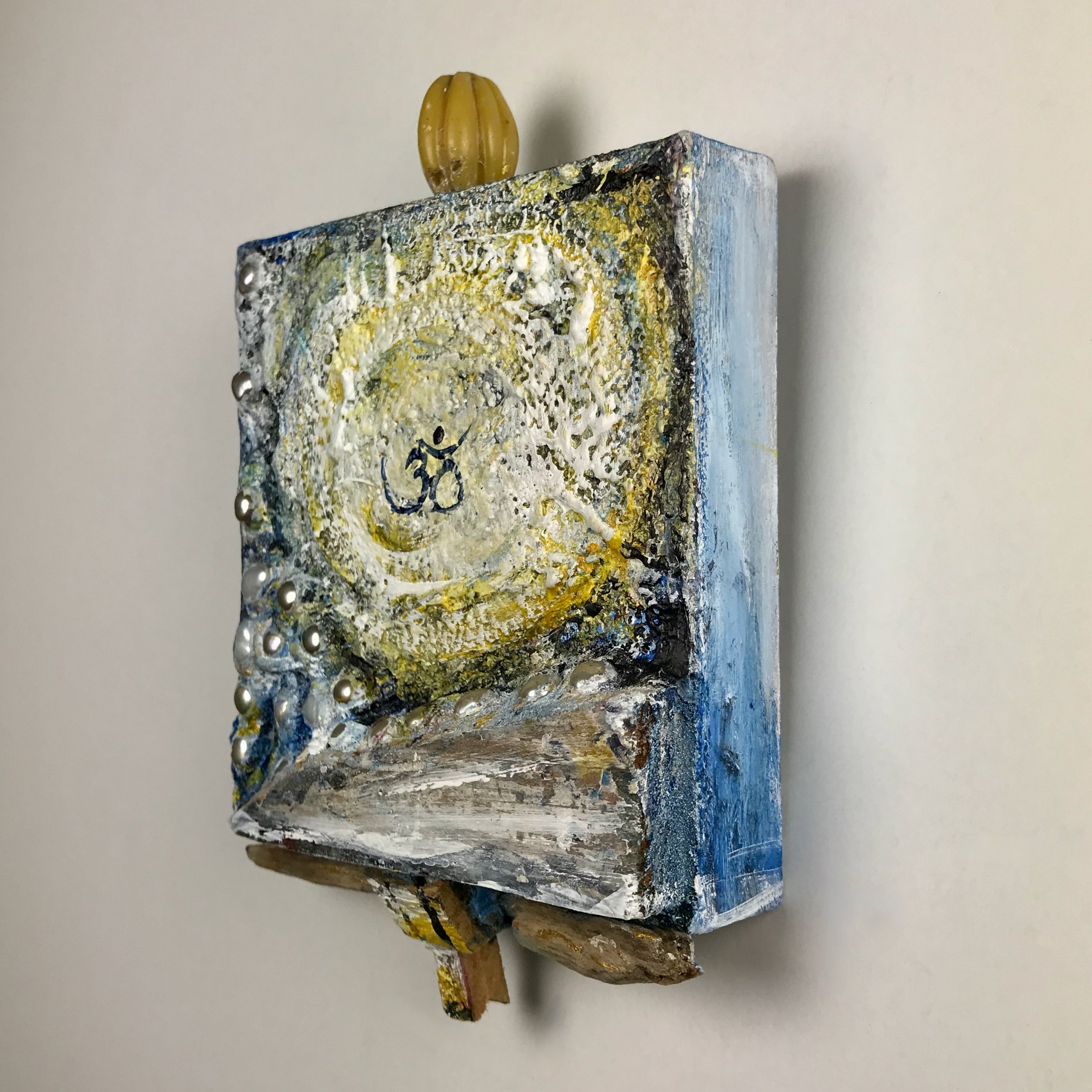 Laura-Trisiano-Om-7-5.75_hx4_wx1_d-one-of-a-kind-mixed-media-found-object-painting-art-reclaimed-upcycled-old-wood-freshwater-pearls-yellow-carnelian-bead-paint- aum-mantra-universal-sound-sa.jpeg