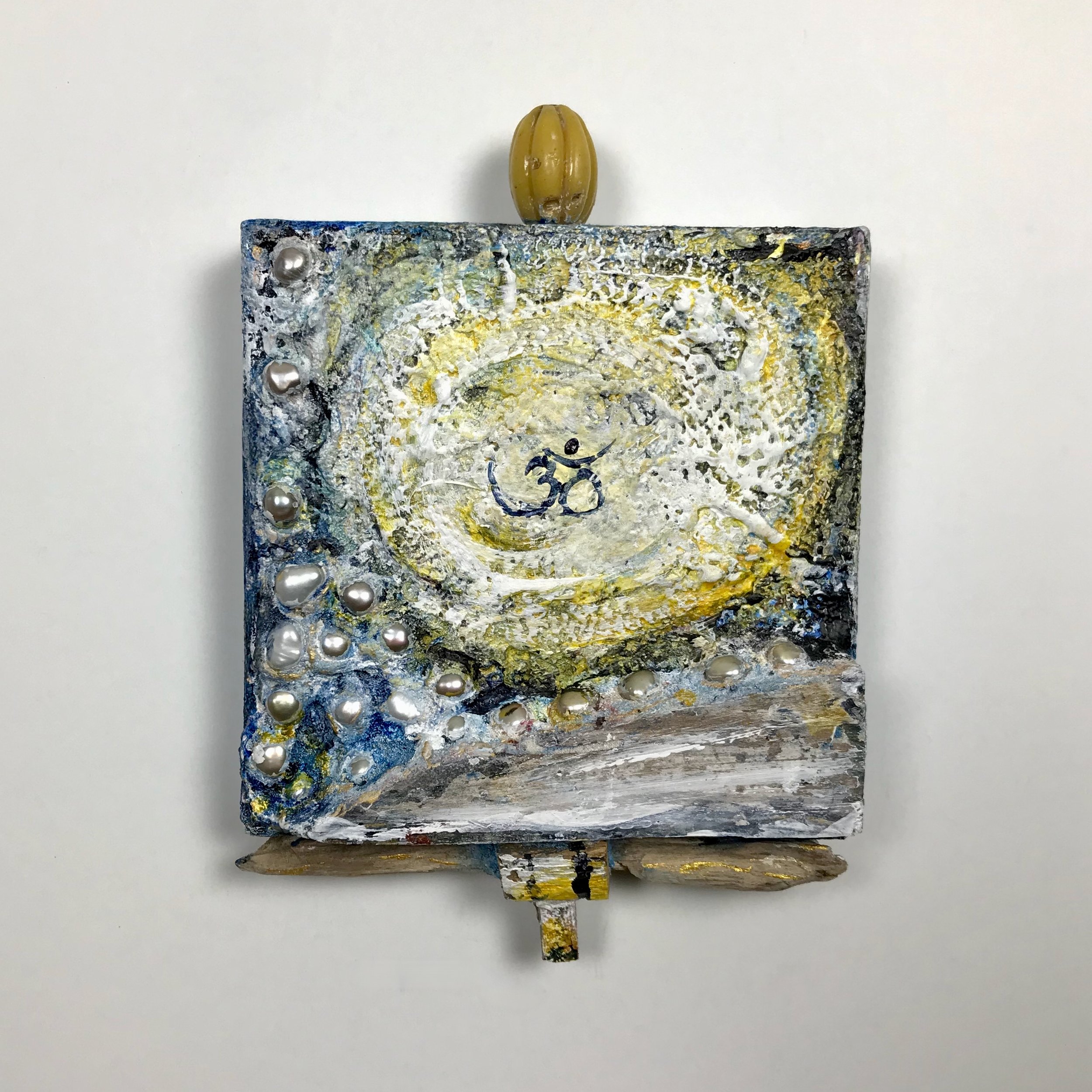 Laura-Trisiano-Om-7-5.75_hx4_wx1_d-one-of-a-kind-mixed-media-found-object-painting-art-reclaimed-upcycled-old-wood-freshwater-pearls-yellow-carnelian-bead-paint- aum-mantra-universal-gateway-.jpeg