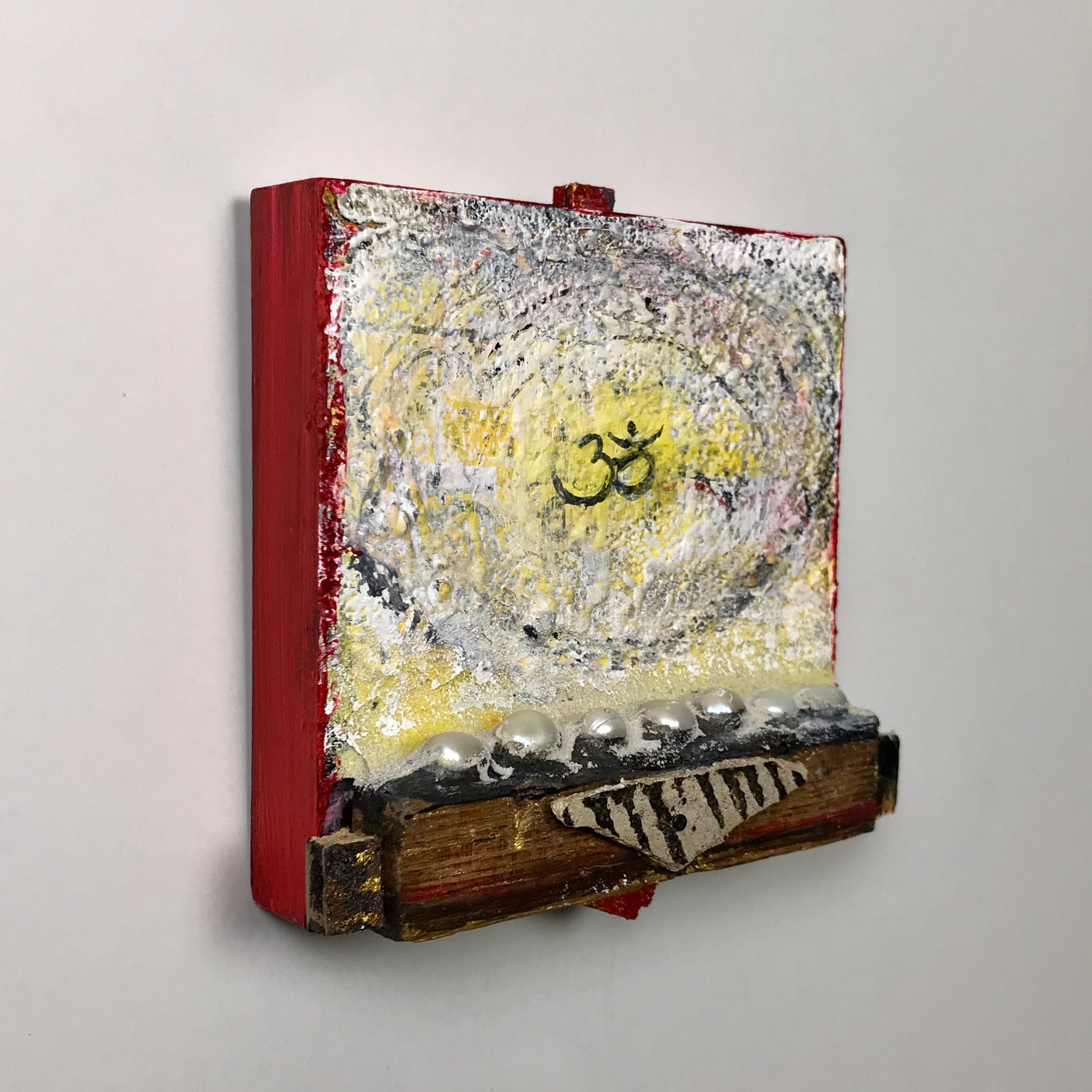 Laura-Trisiano-Om-13-4.75_hx4.5_wx1.5_d-one-of-a-kind-mixed-media-found-object-painting-art-reclaimed-upcycled-old-wood-freshwater-pearls-paint- aum-mantra-universal-sound-sacred-chant-sa (1).jpeg