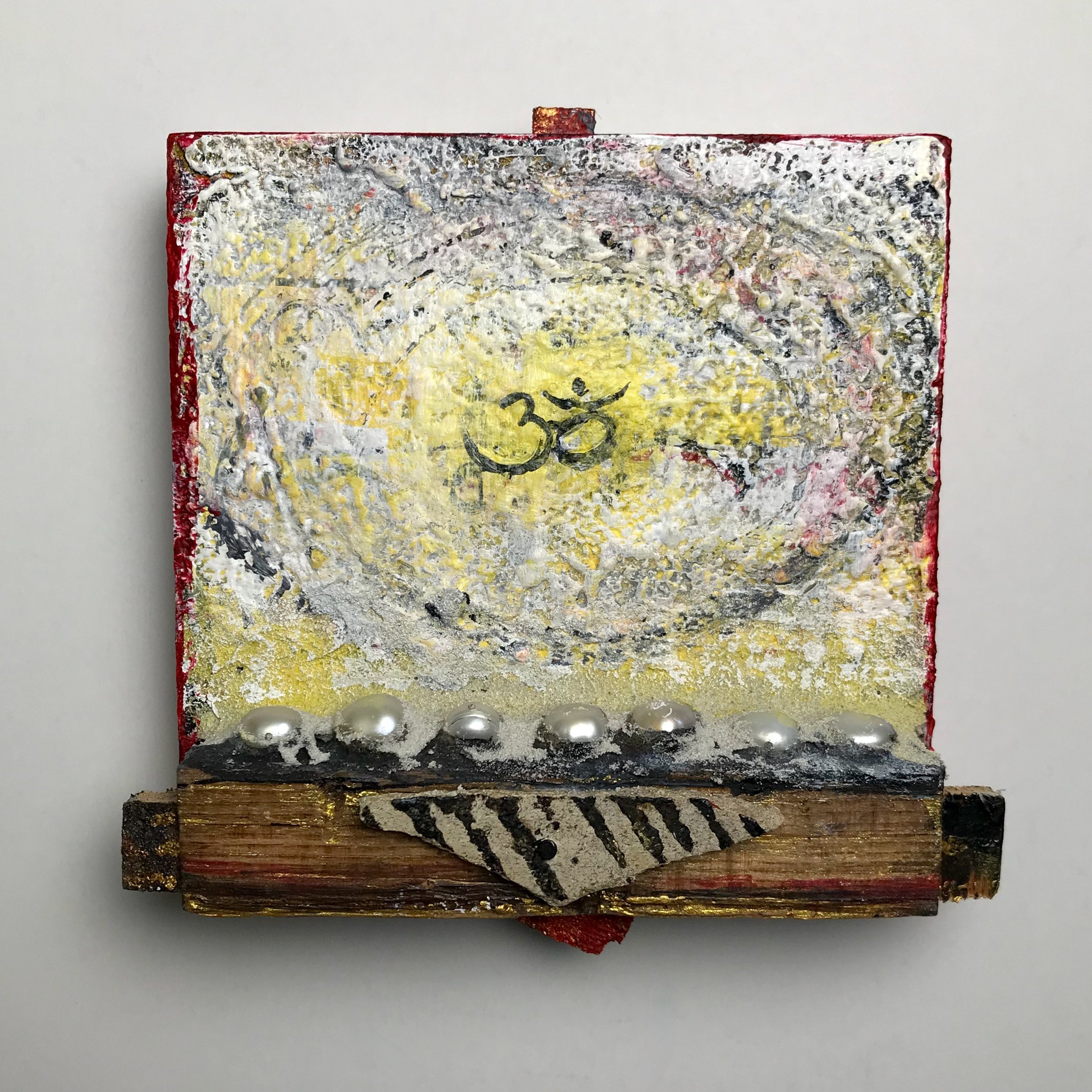 Laura-Trisiano-Om-13-4.75_hx4.5_wx1.5_d-one-of-a-kind-mixed-media-found-object-painting-art-reclaimed-upcycled-old-wood-freshwater-pearls-paint- aum-mantra-universal-sound-sacred-chant-sanskr.jpeg