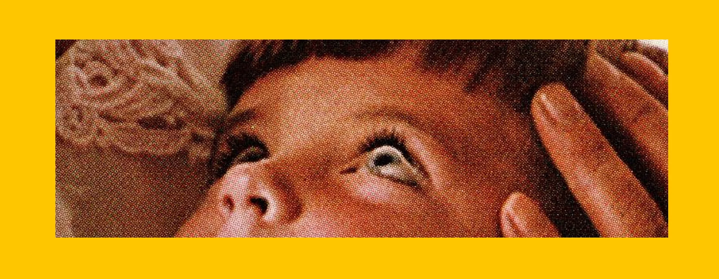 A woman receiving a facial massage with her eyes open, surrounded by a yellow border.