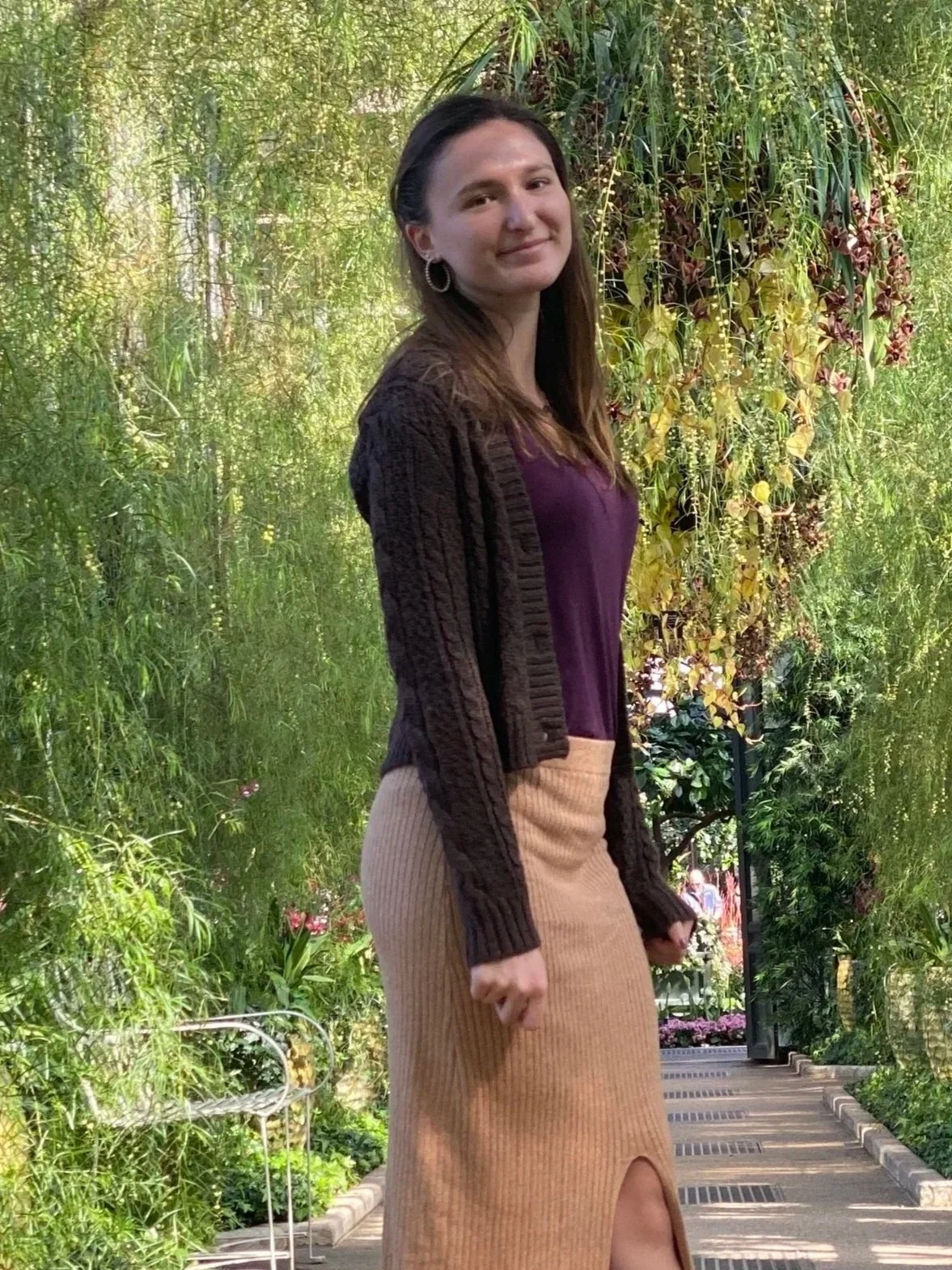 Virginia surrounded by hanging plants