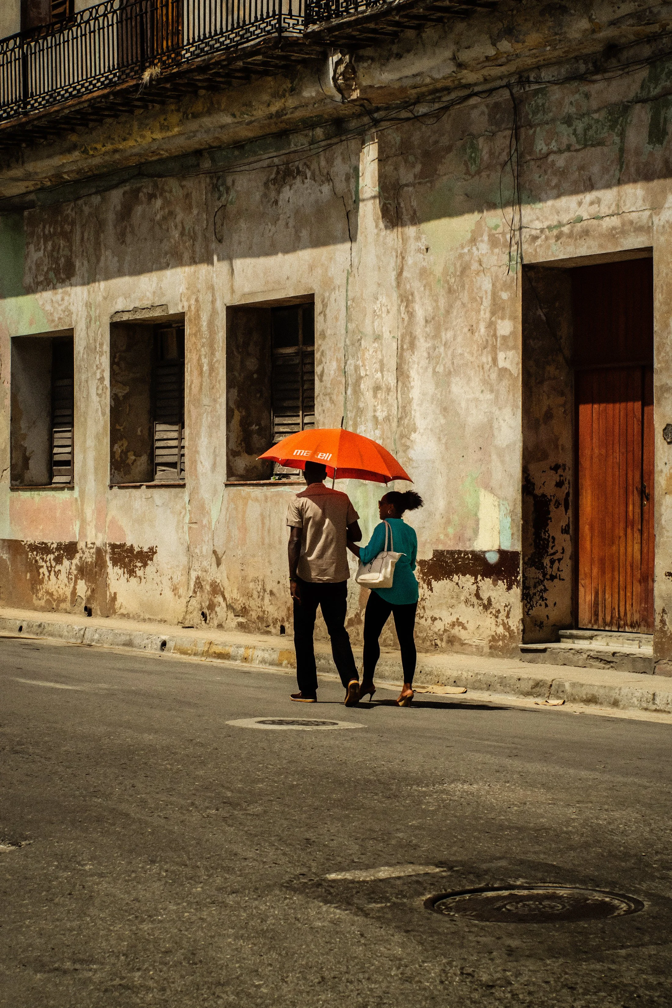 Lovers With Orange Umbrella
