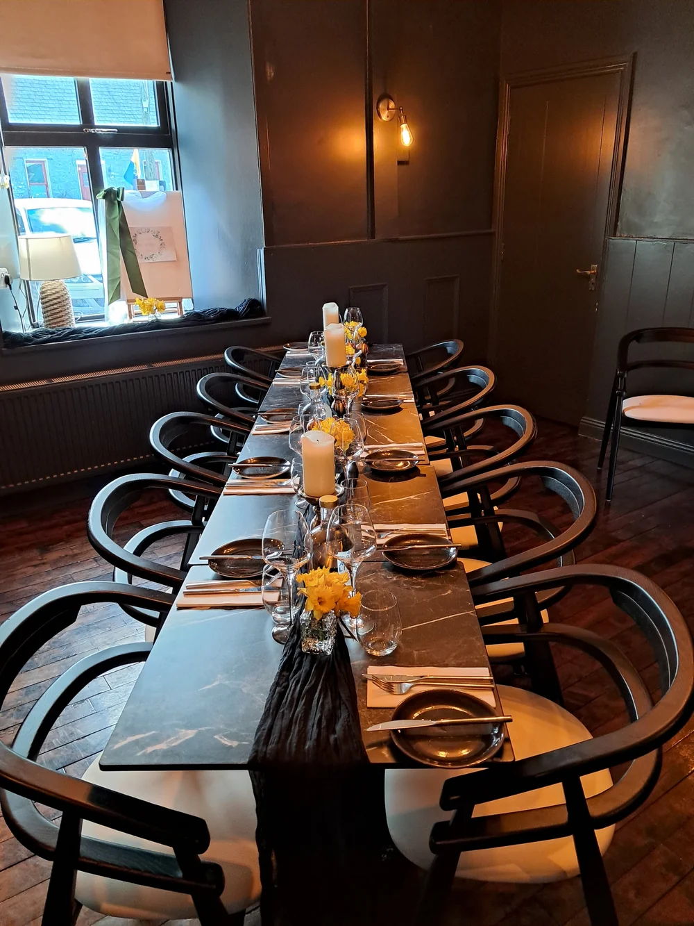 Kalee and Kristian celebrating with family at Vaughan's after their Cliffs of Moher ceremony