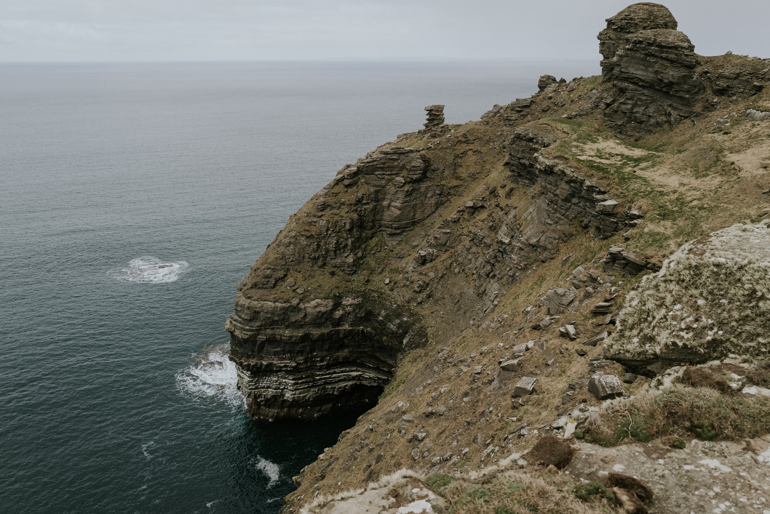 Kalee and Kristian together at the Cliffs of Moher on their wedding day