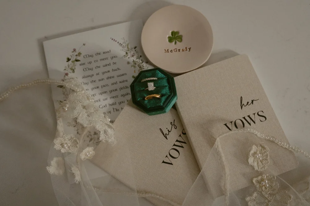 The couple at Dunquin Pier with the Dingle Peninsula stretching behind them