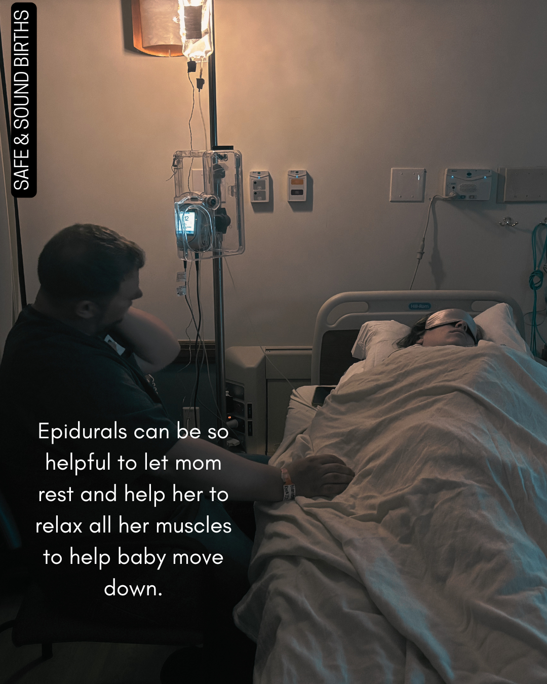Woman in labor with her epidural placed. She is resting with a sleep mask, soft lights, and her partner by her side in Annapolis, Maryland.