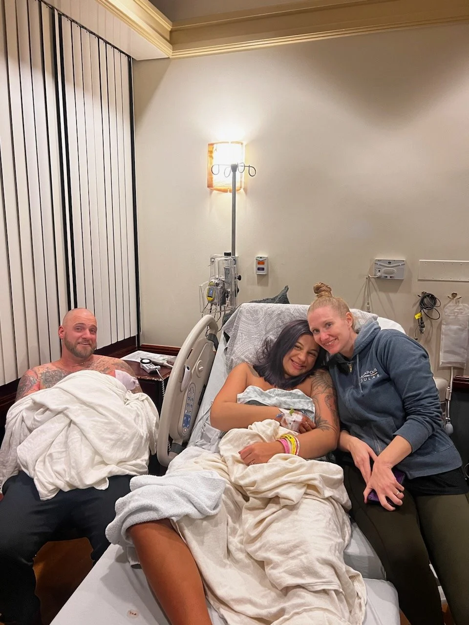 Dad skin to skin time while I snuggled up mom after her amazing birth at AAMC.