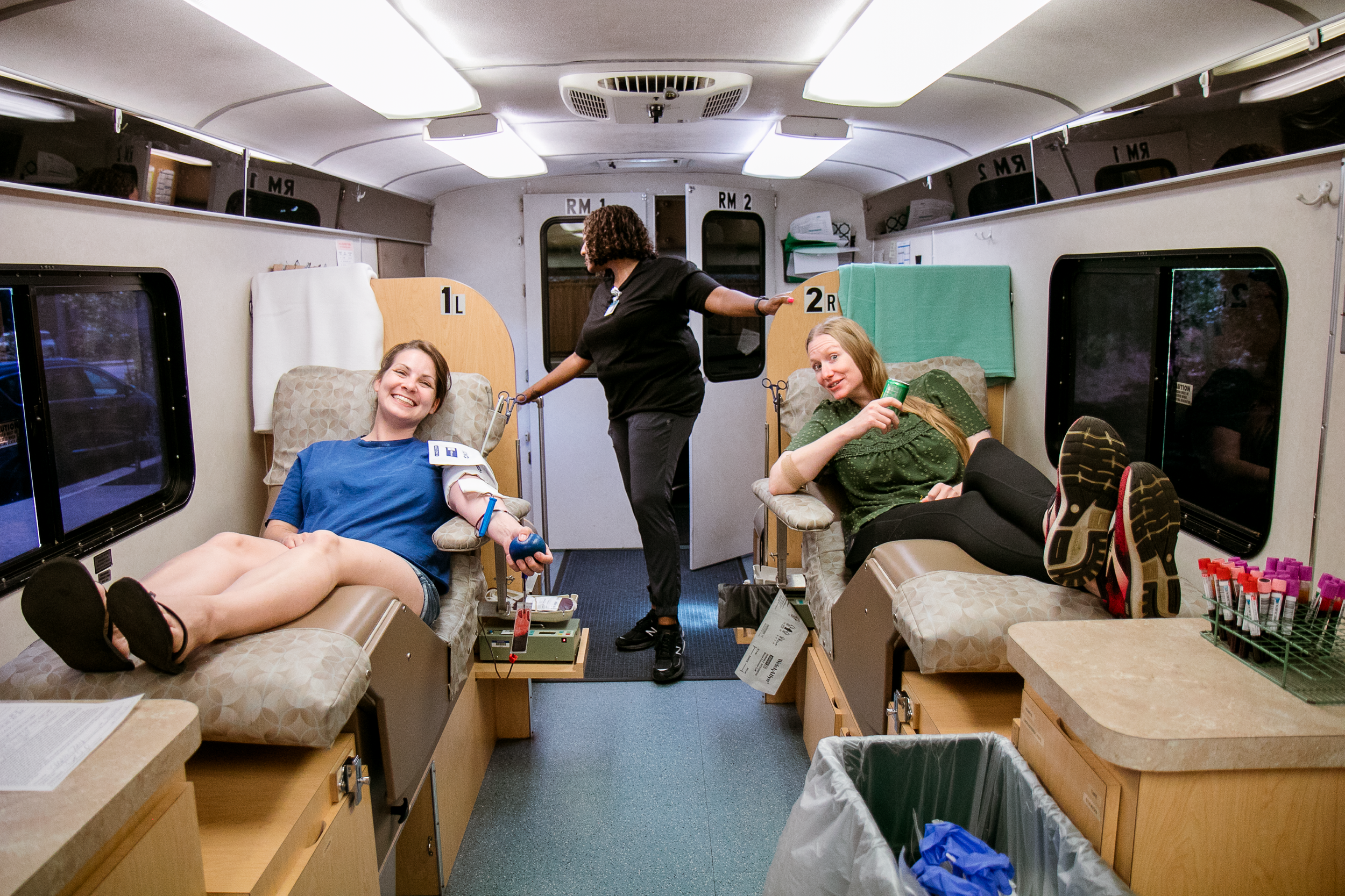 Sarah Austin & volunteer donate blood during the blood drive.