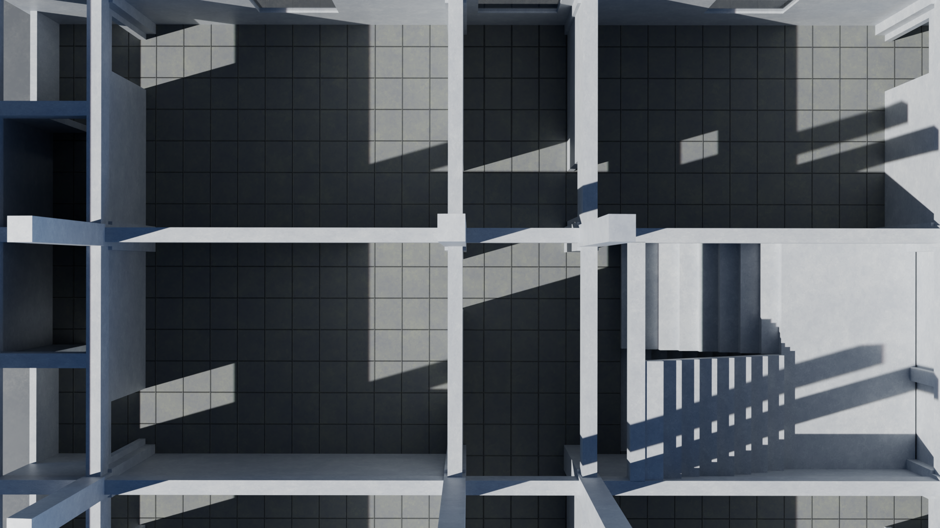Top-down view of a modern building under construction with visible concrete beams and shaded areas, showing multiple floors with tiled surfaces.