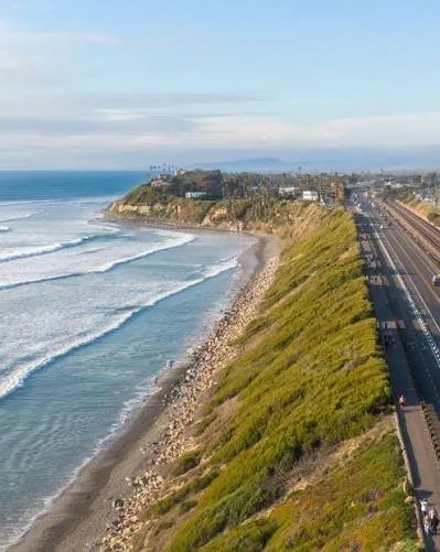 Carlsbad seawall sunset evening walk vacation rental one block from beach