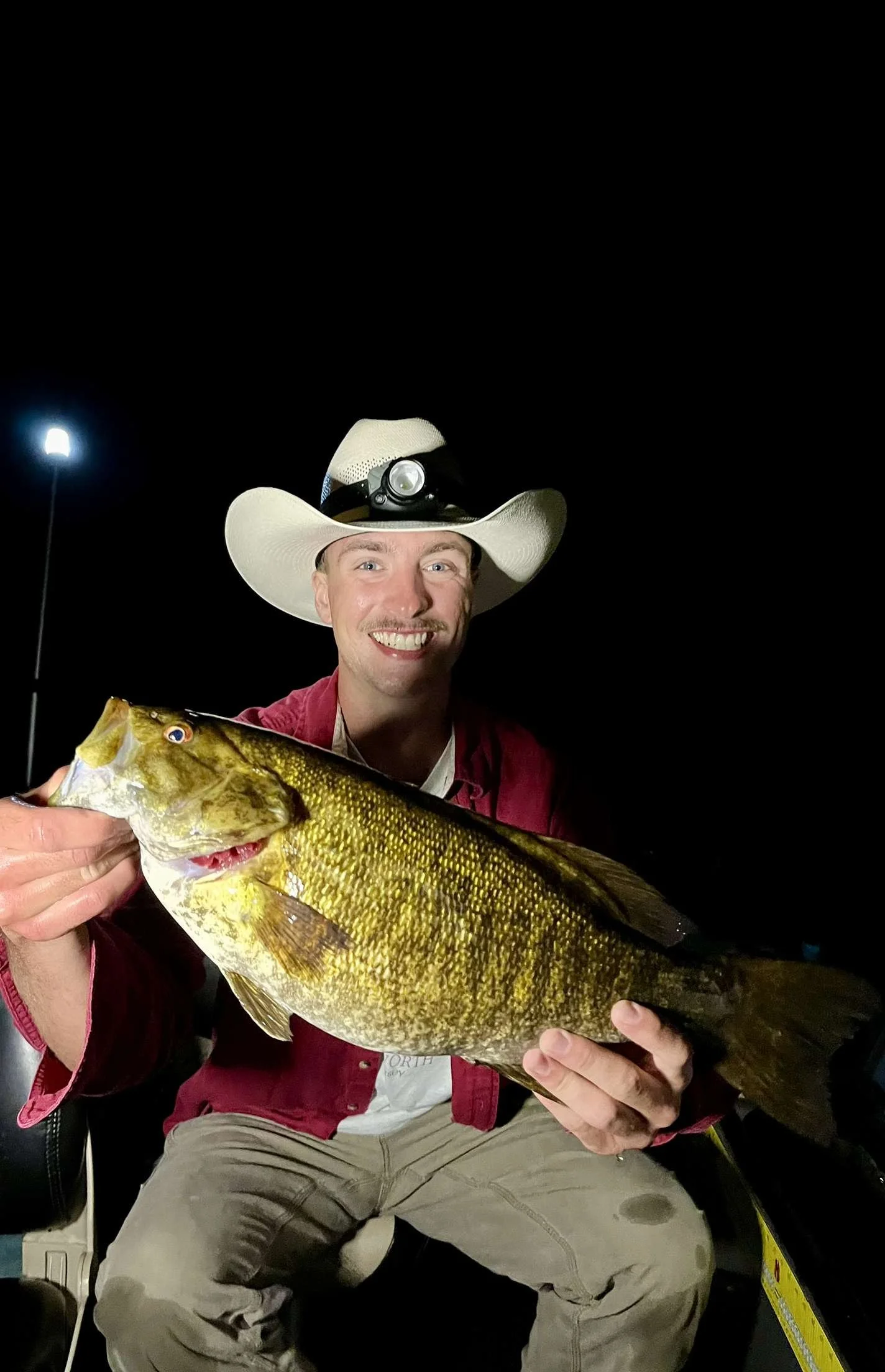 a 19" 4.5lb smallmouth bass - incredible weight for that length in August!