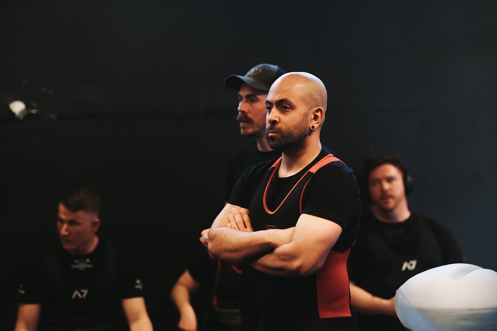 shani mirza with arms crossed in gym