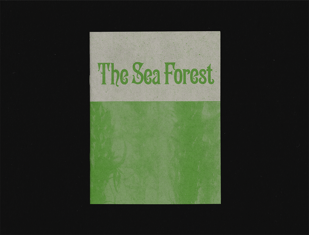 Book titled 'The Sea Forest' with a green and gray cover against a black background.