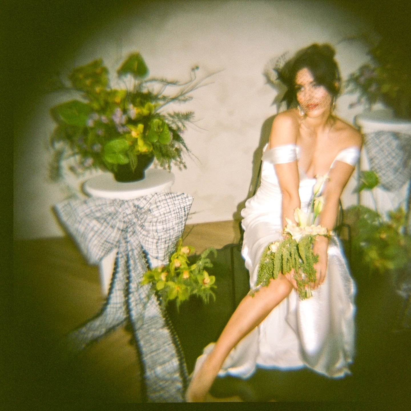 There's just something about shooting film that feels so much cooler...

Design @madbashgrp 
Photography @danijelaweddings
Model @kalinakkuma
Hair and Makeup @taylorswitzermakeup
Gown @loversland 
Florals @bloemplease
Tabletop @plateoccasions
Station