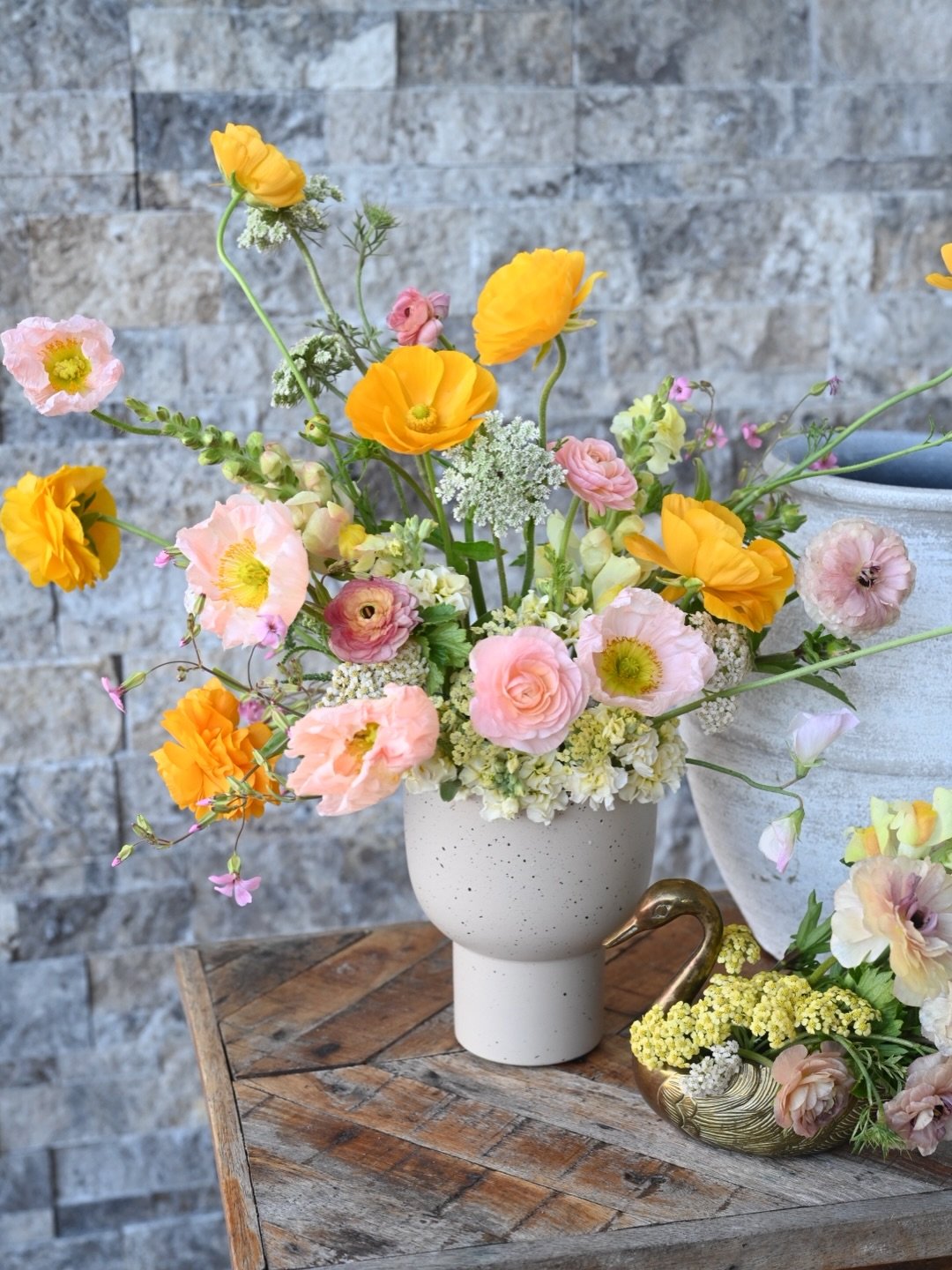 Have been dying to arrange using this precious vintage swan from @fond_little_finds and these cr&egrave;me br&ucirc;l&eacute;e, iridescent washed butterfly ranunculus felt like the perfect choice to capture a few soft &ldquo;feathers&rdquo; to bring 