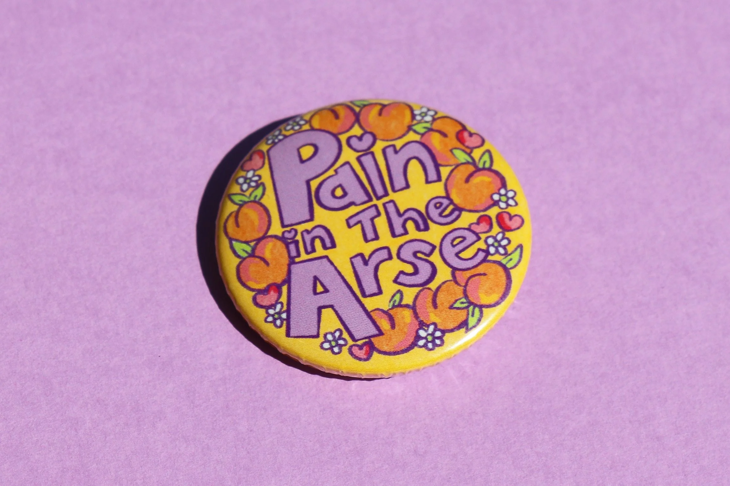Pain in the arse badge 2.jpg