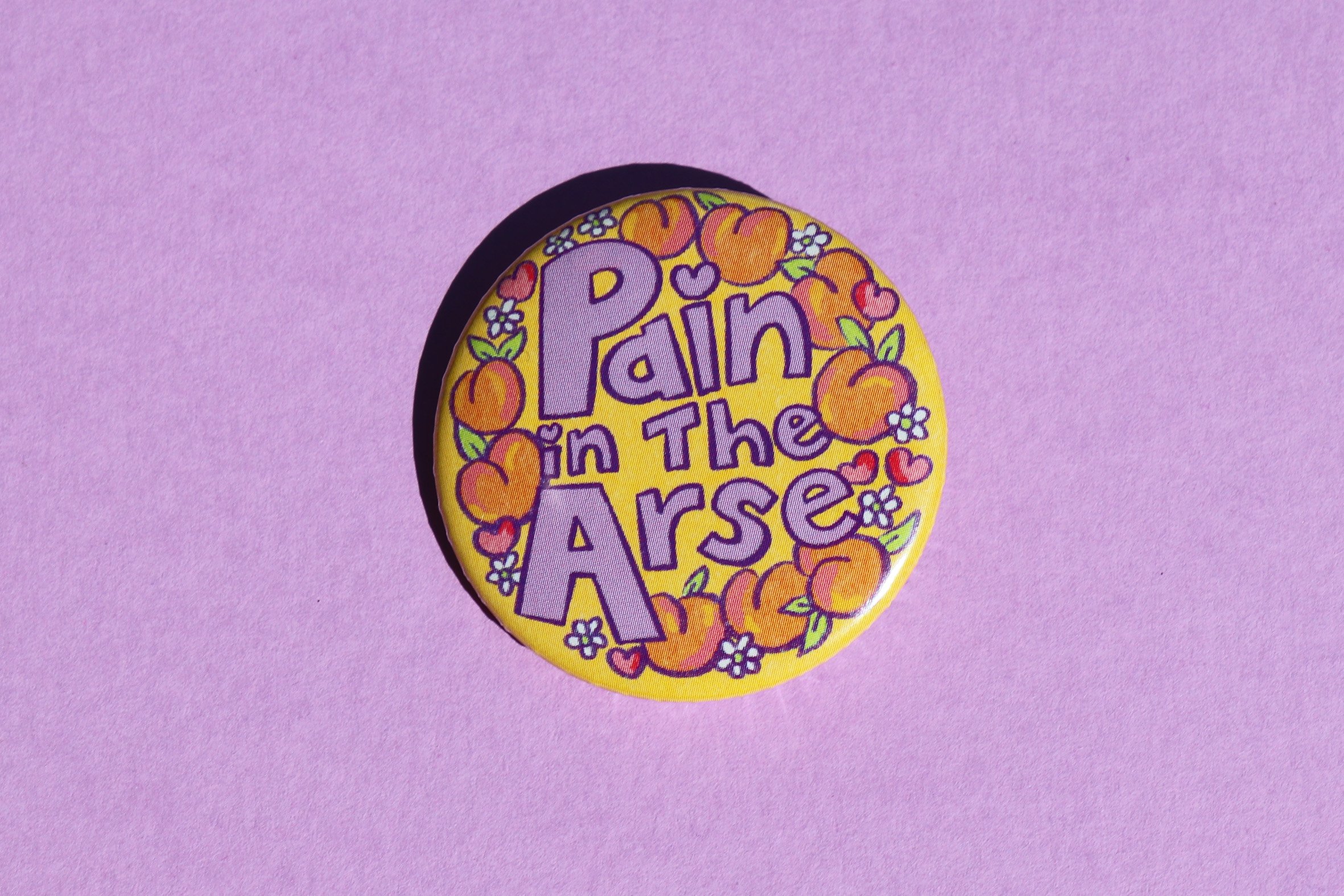 Pain in the arse badge.jpg