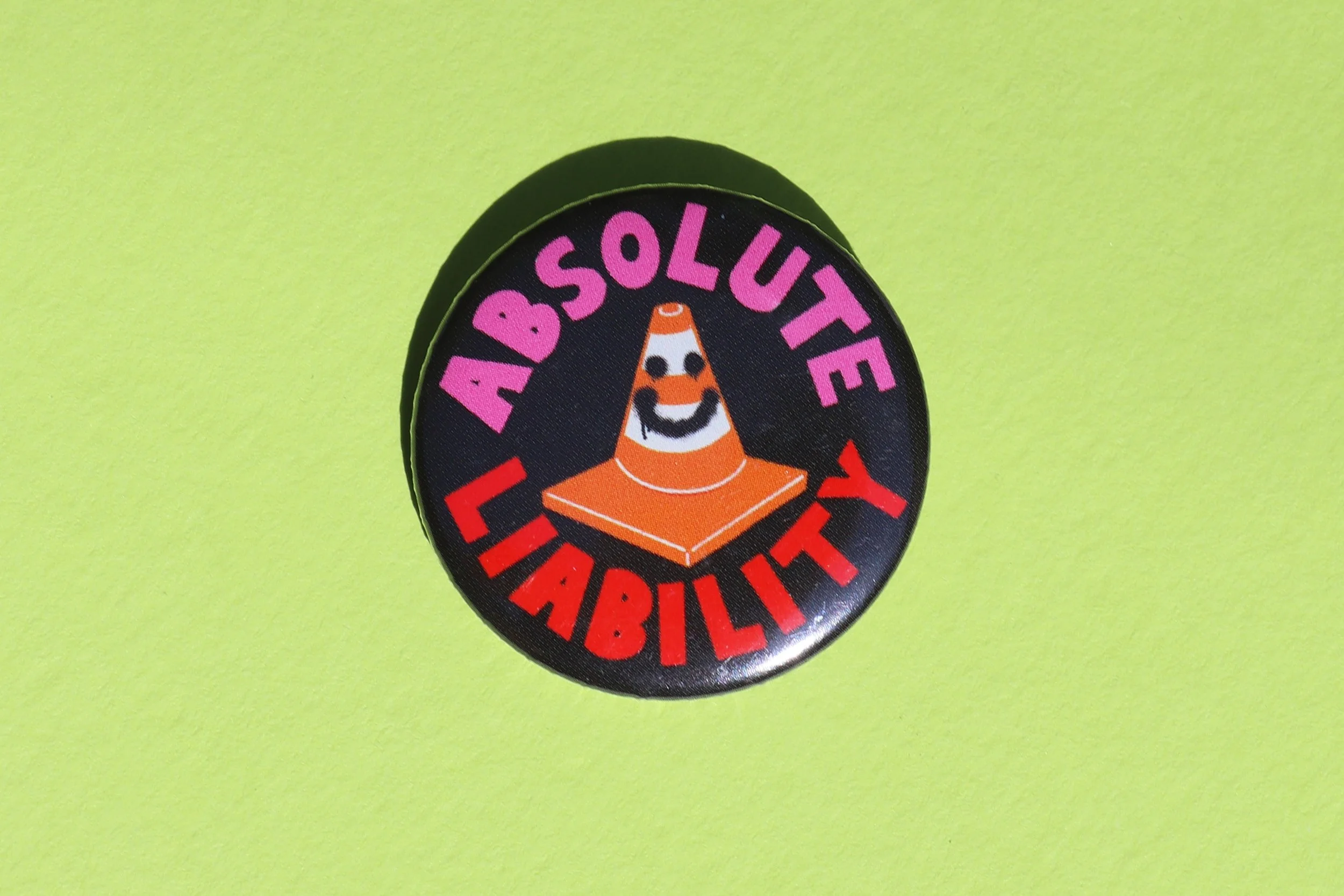 Absolute Liability - Smiley Traffic Cone Badge