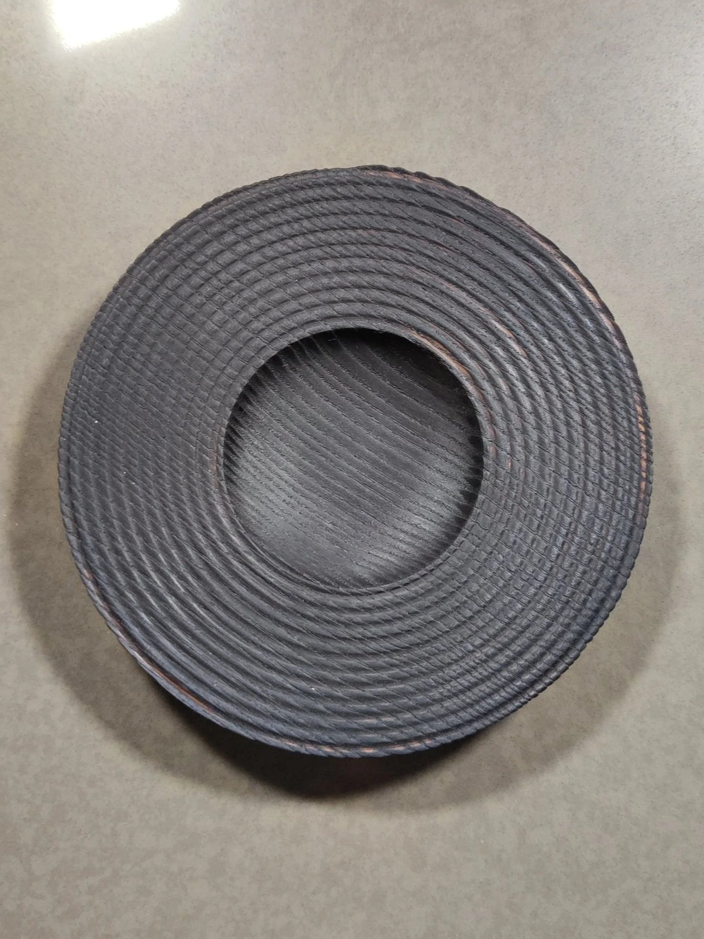 Ebonised ash bowl with wavy rim