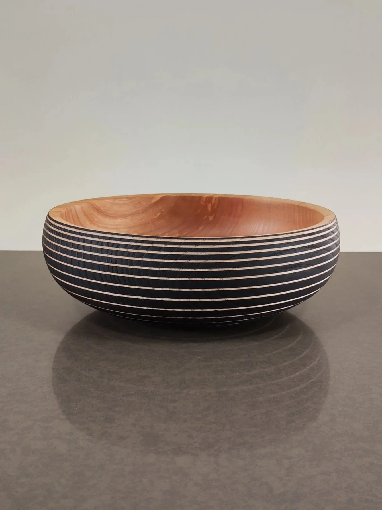Ebonised ash bowl with stripes