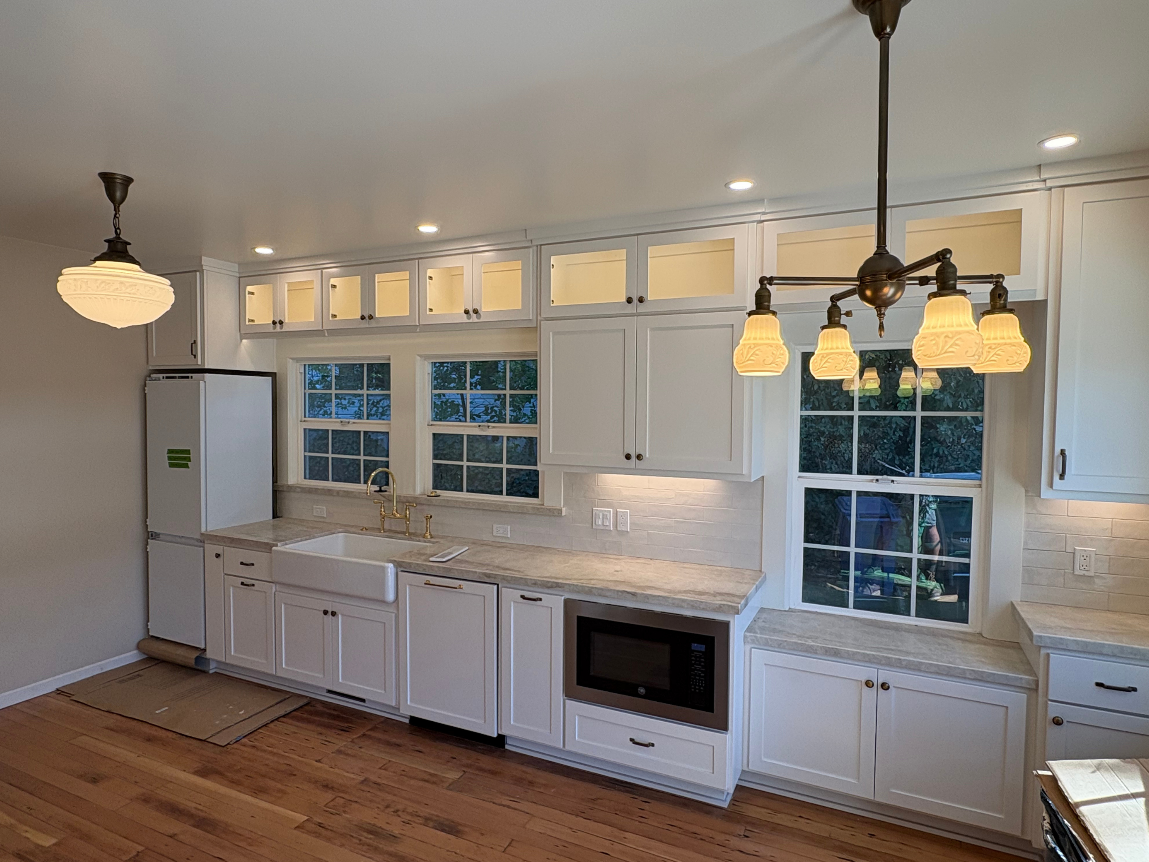 remodeled entire kitchen with new wiring, new outlets, installed light fixtures. Upper and lower cabinet lighting was also installed.