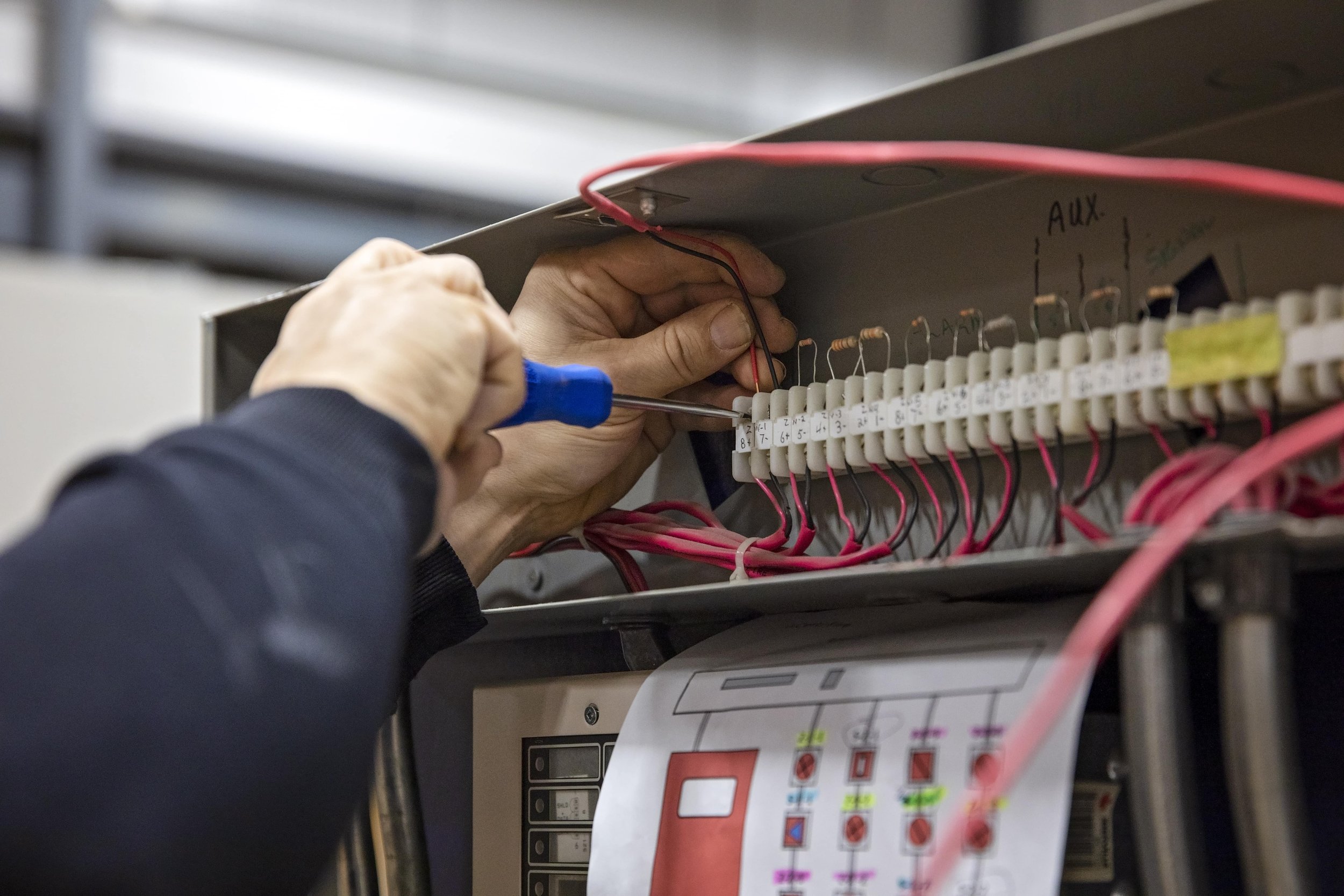 Working on fire alarm panel