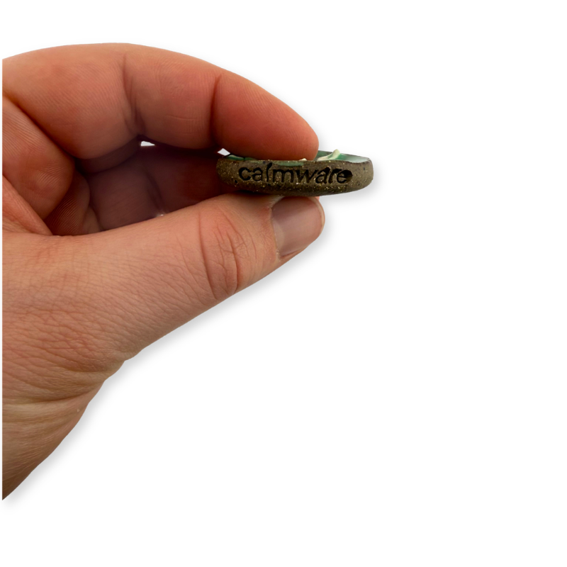 Regeneration Worry Stone_Side_in hand.png