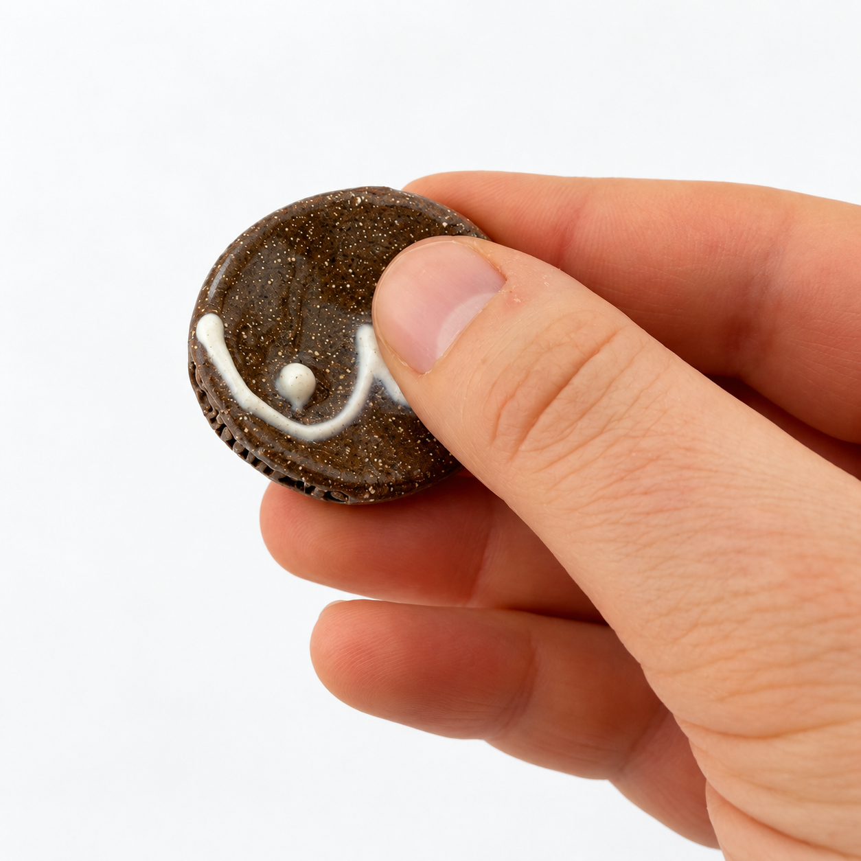 Tender stone_Brown_In Hand.png