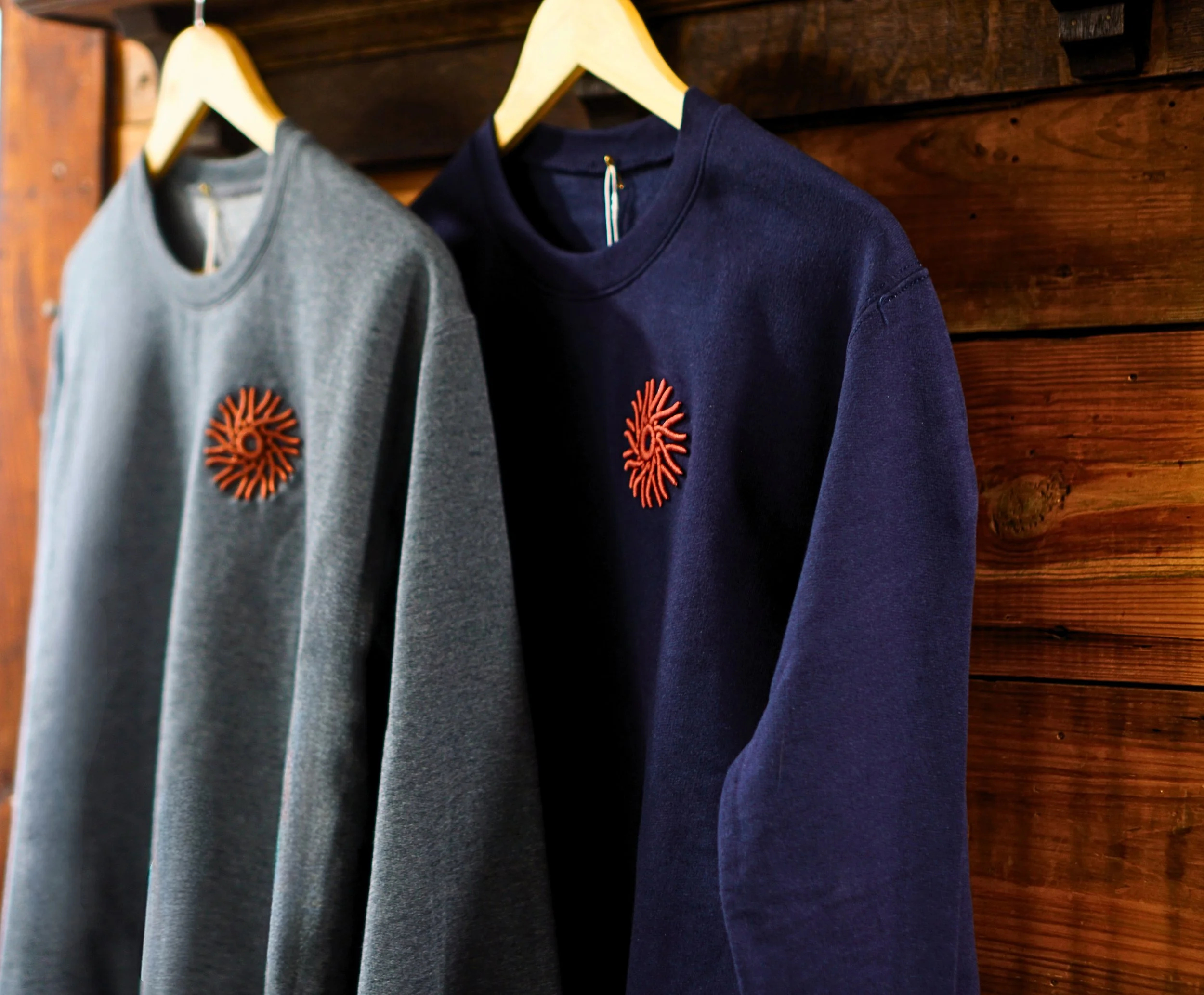 ComeHome_Sweatshirts_Hanging_Navy+Grey.jpg