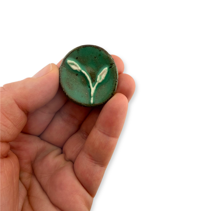 Regeneration Worry Stone_In Hand.png