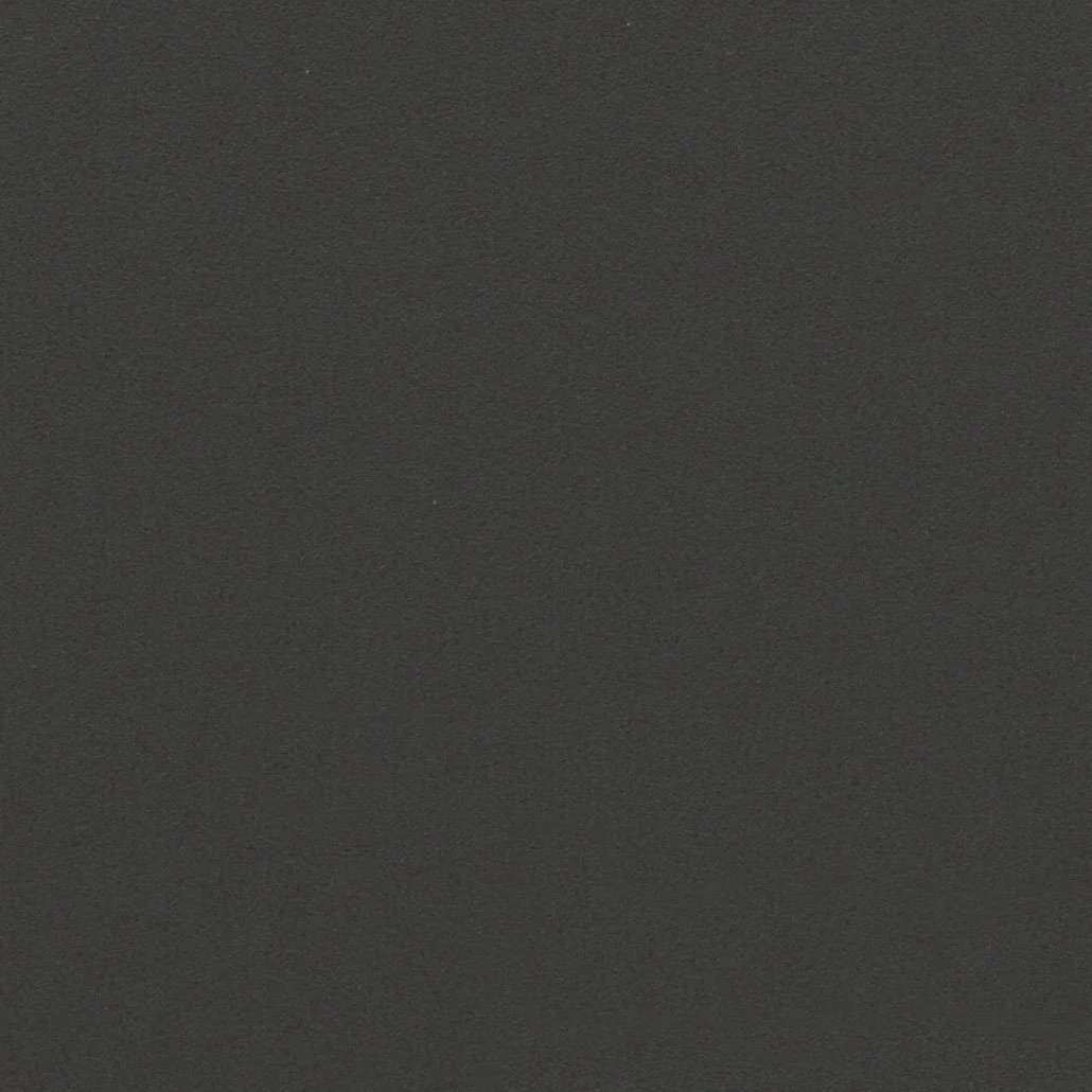 A plain, dark gray textured surface.