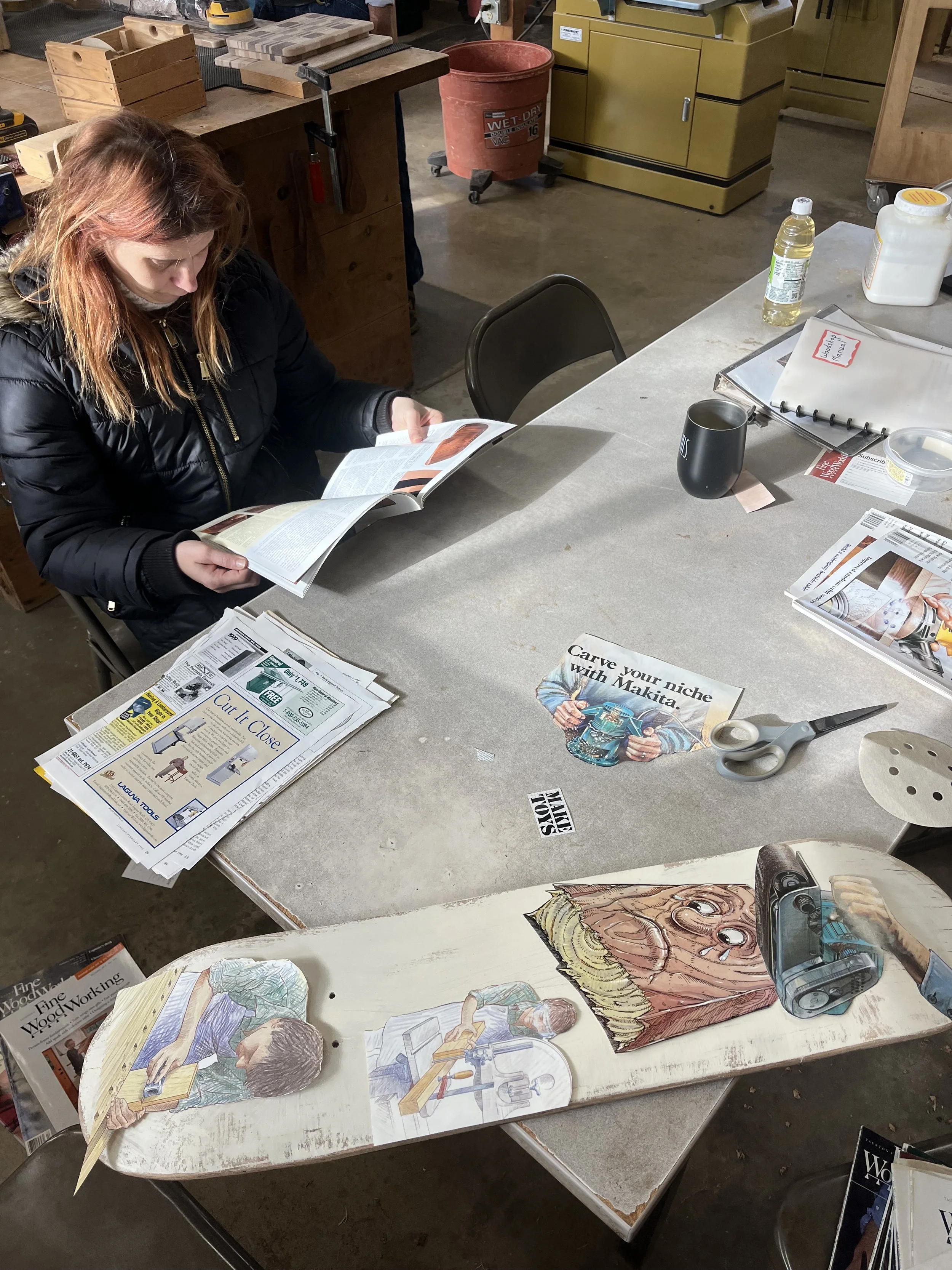 Brooke searches for photos to collage onto a board