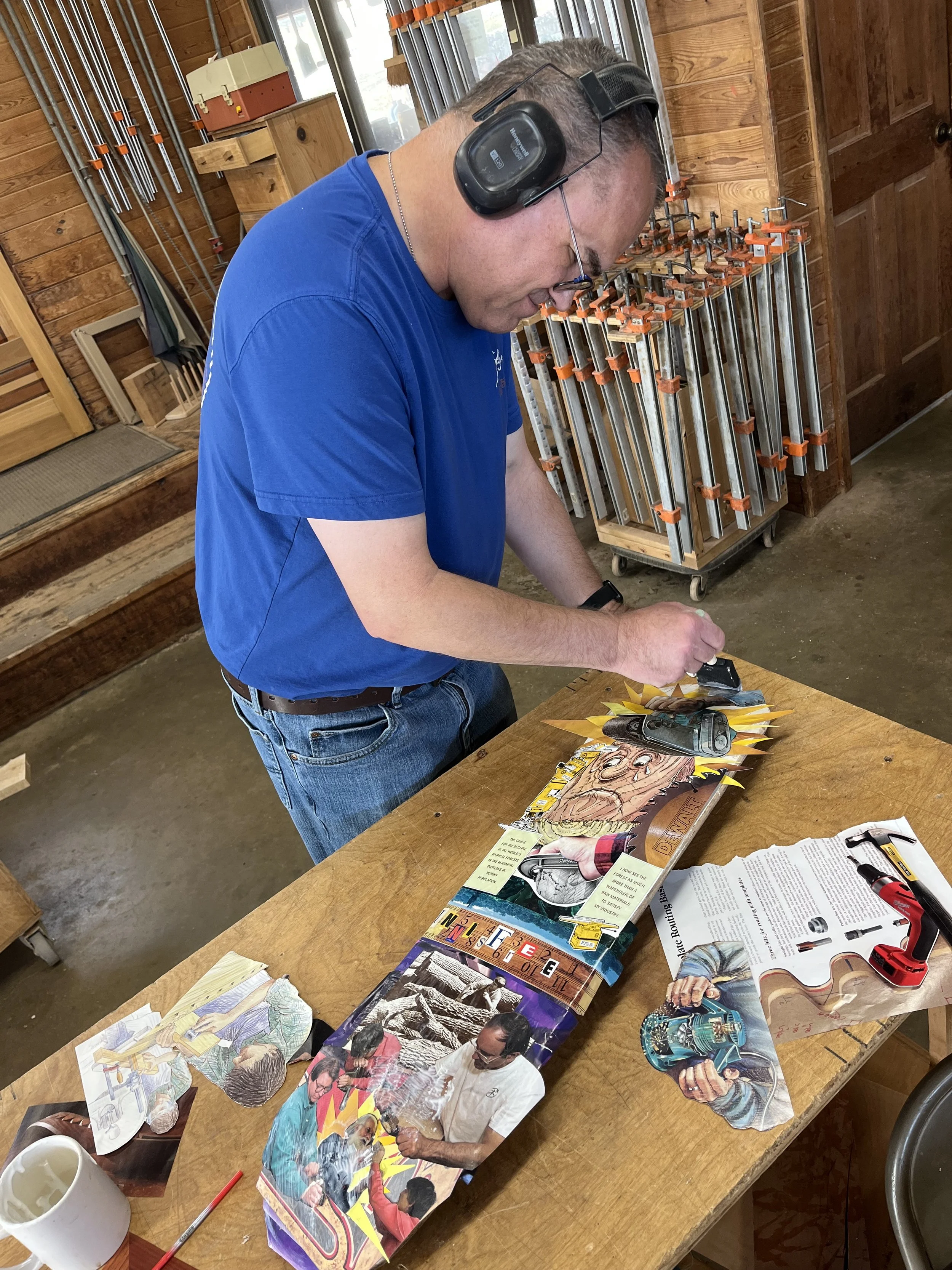 Mark applies glue to the collaged photos