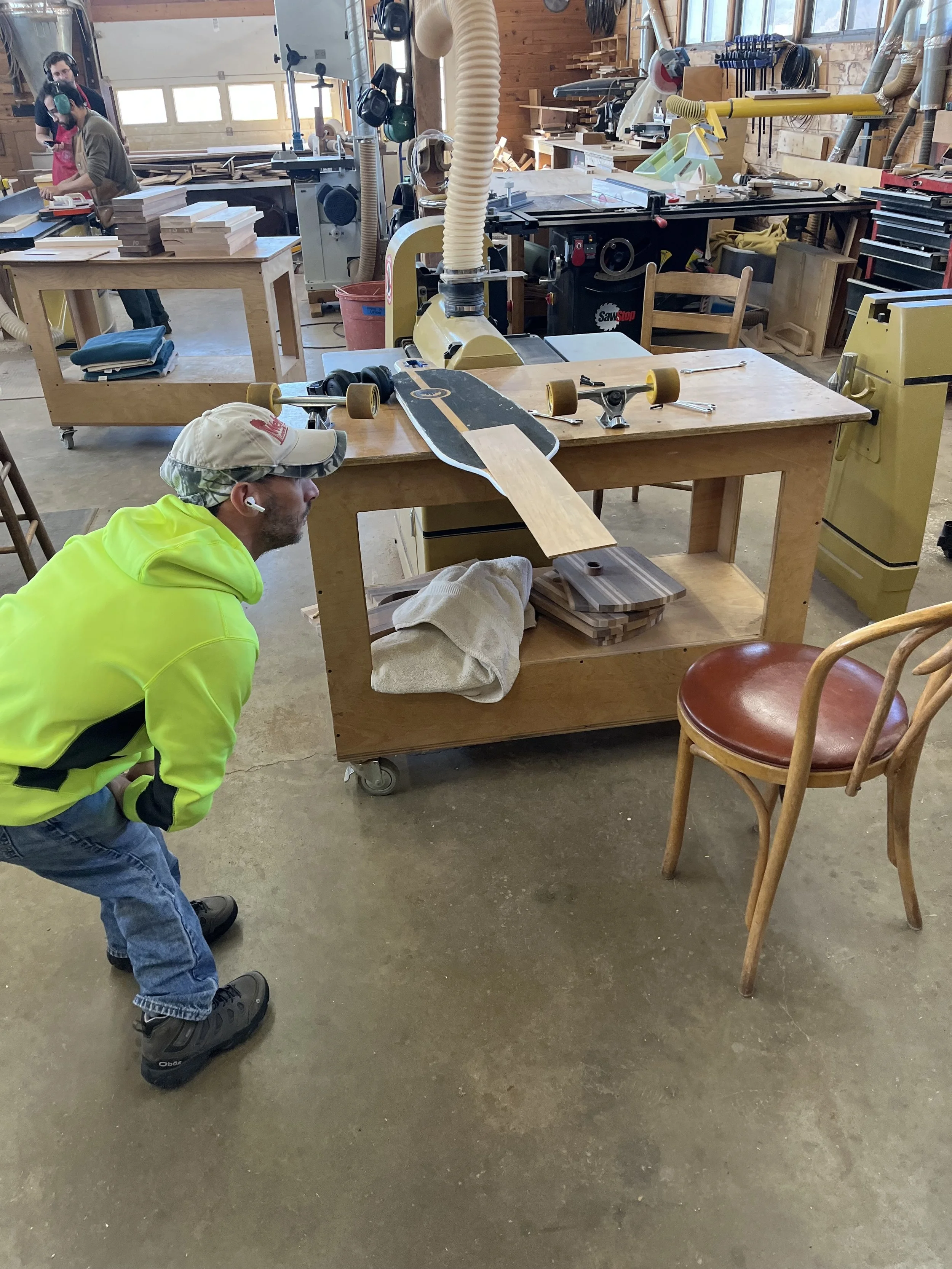 Kevin inspecting a board ready to be refurbished
