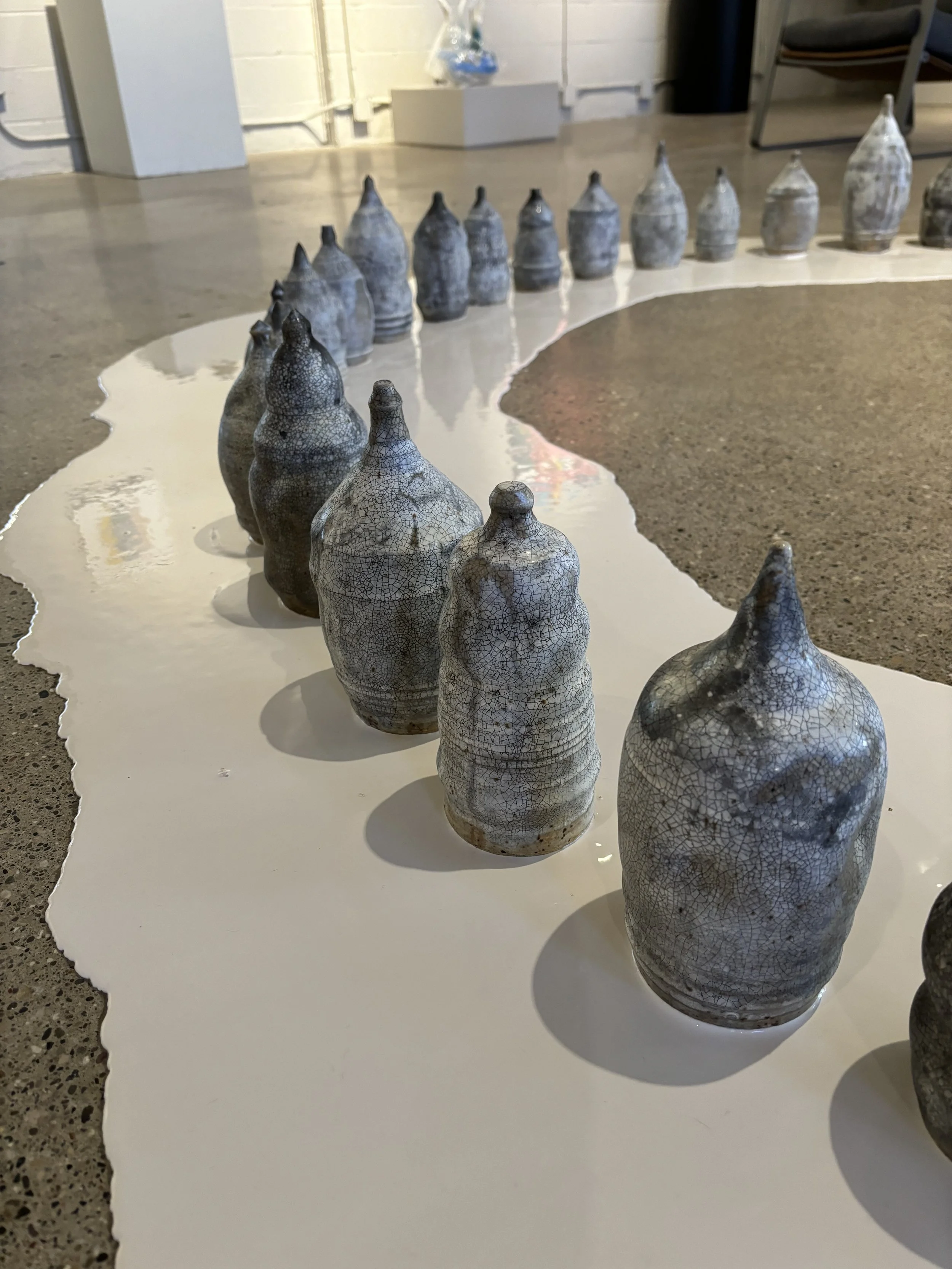 "Remains of Care," 8' x 8,' ceramic, ink, raw glaze, 2024