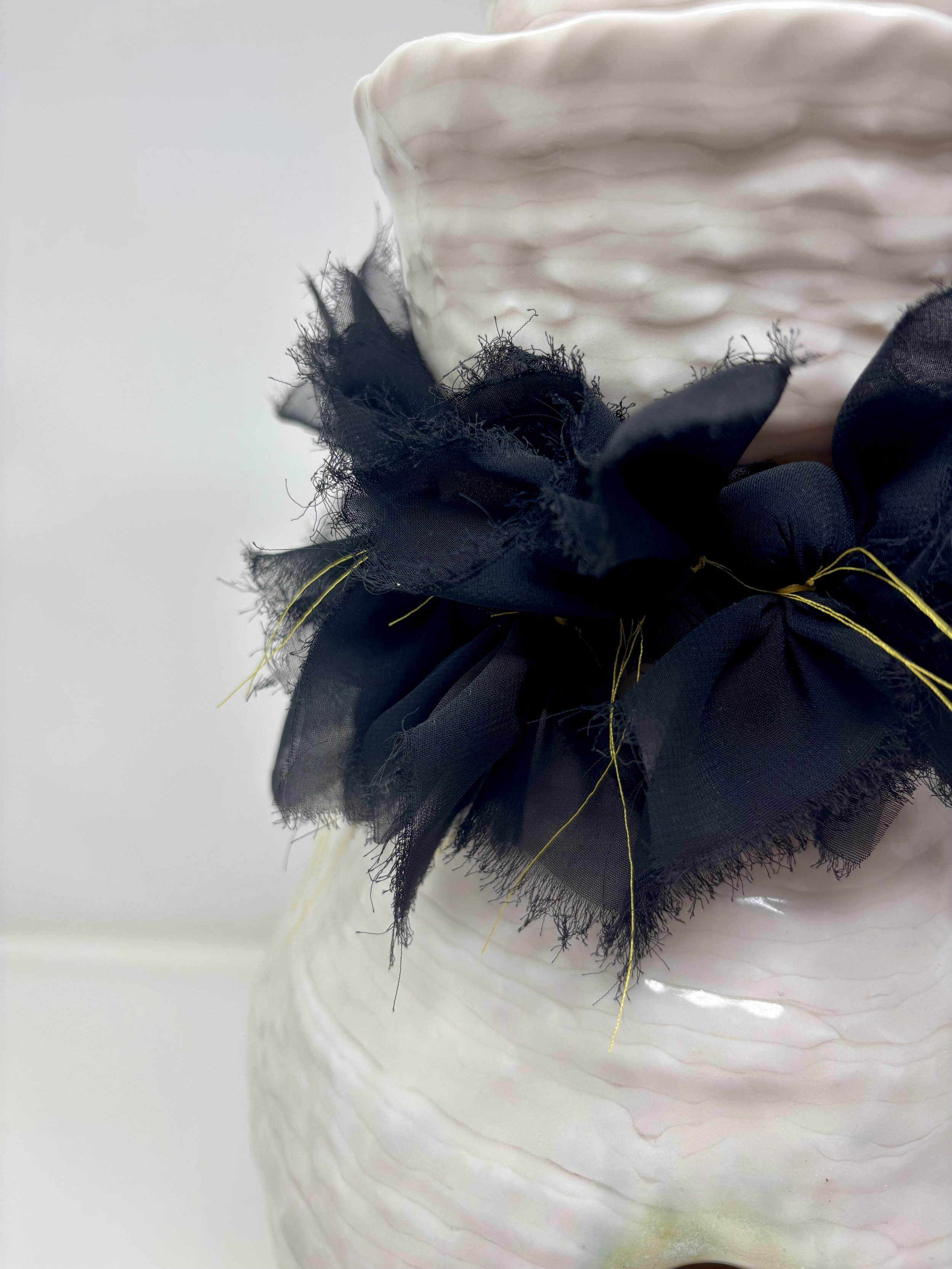 "Empty Vessel #1," ceramic, chiffon, thread, 2026