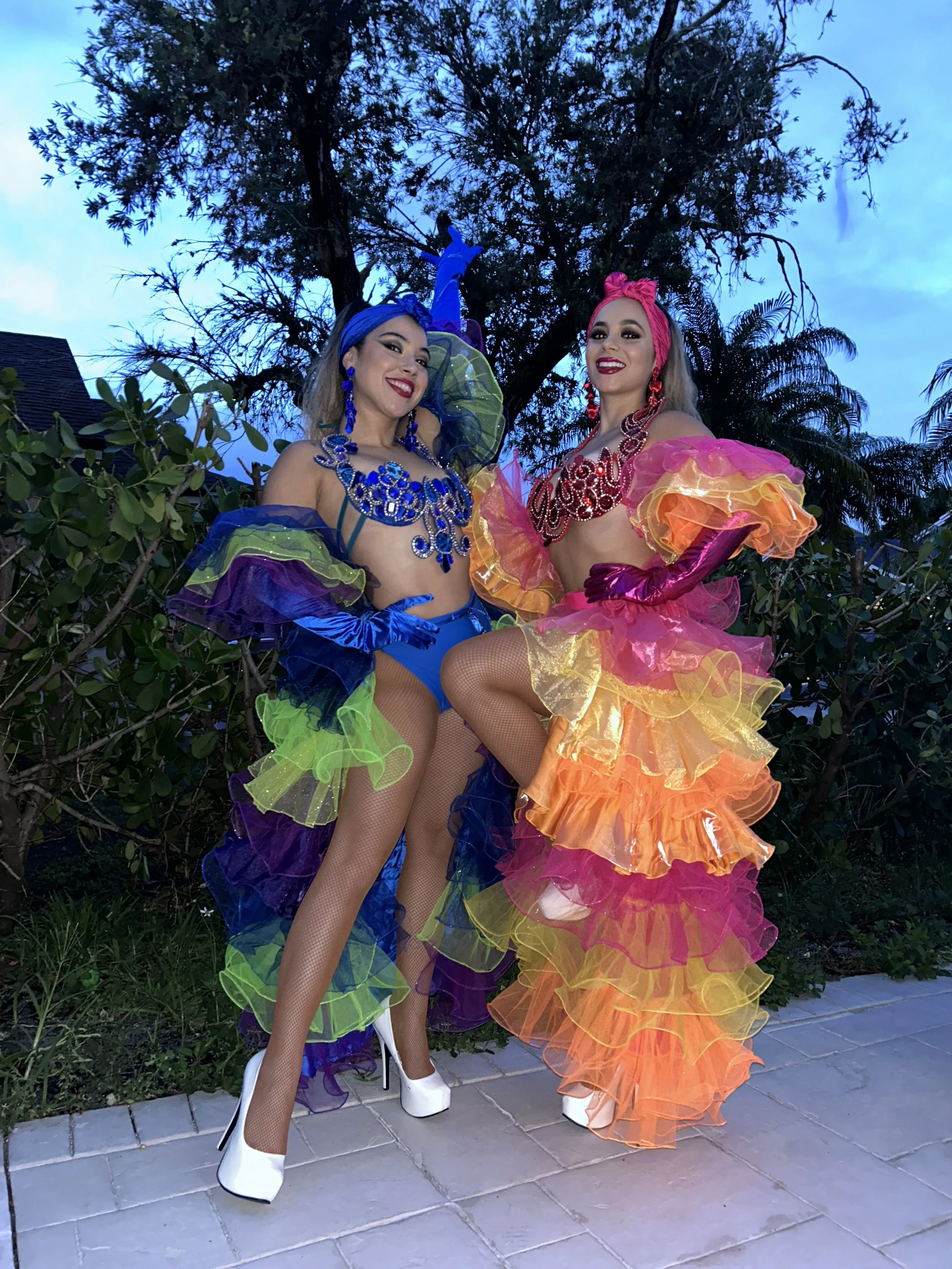 Hora Loca performers dancing and interacting with guests at a Miami party
