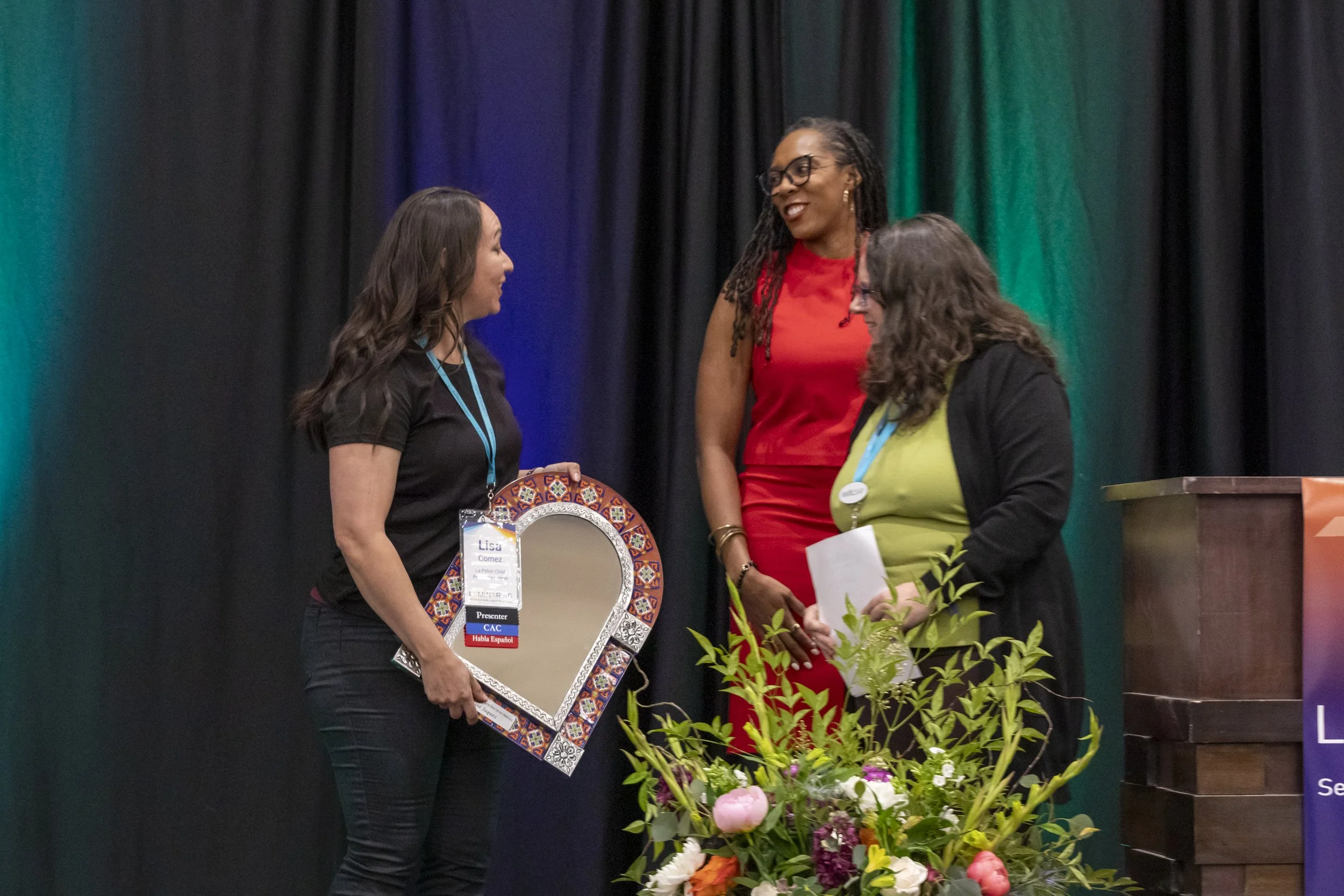 A woman accepting an award