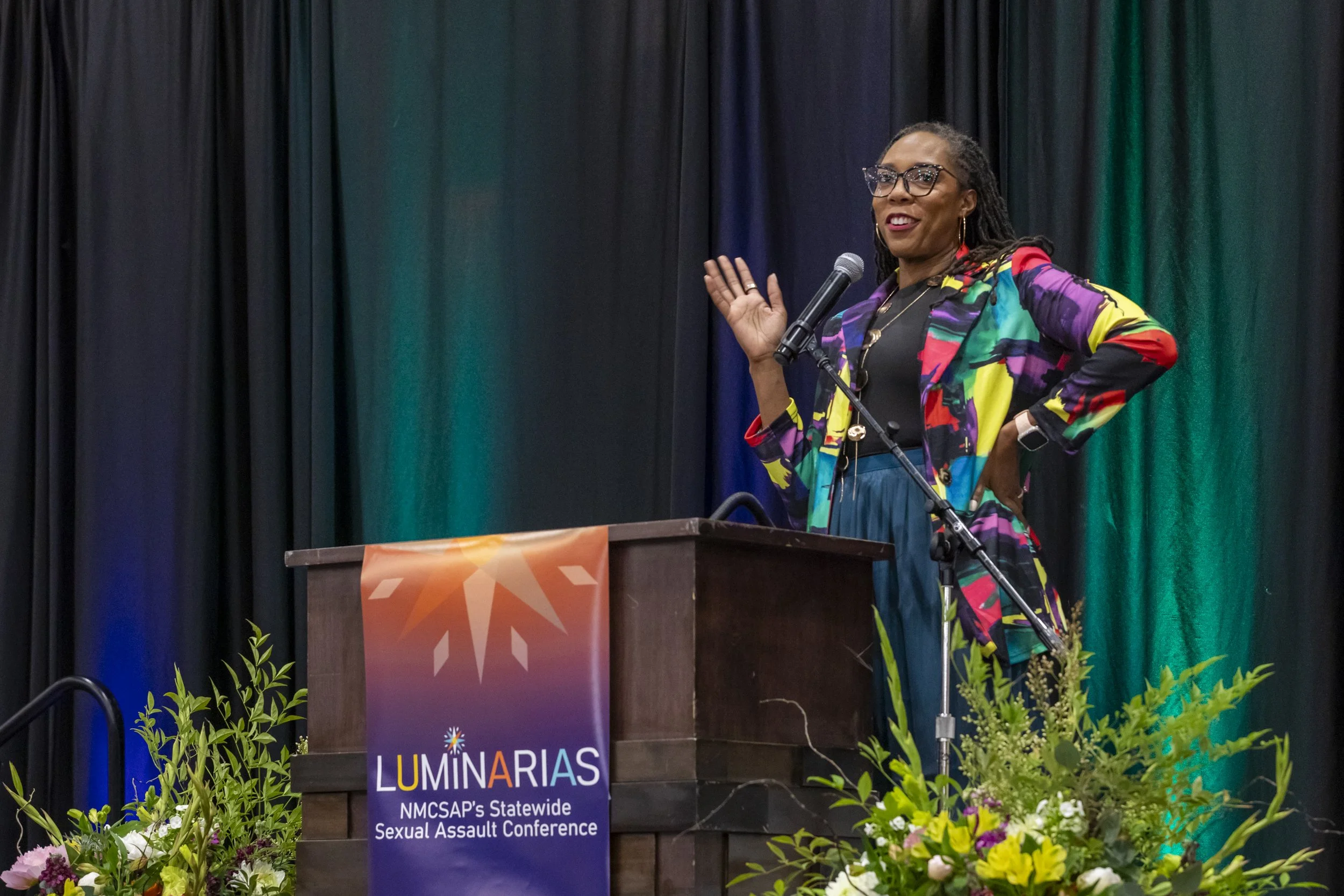 A woman speaking at a podium