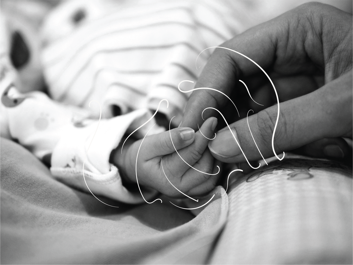 A baby's tiny hand gripping an adult finger, a tender and vulnerable moment capturing the fragility of the mother and baby bond